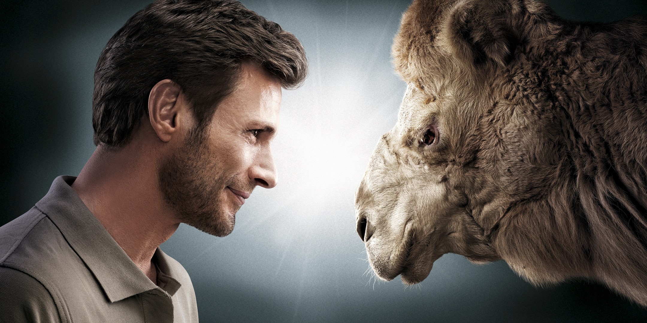 Man and camel looking at each other HD Wallpaper