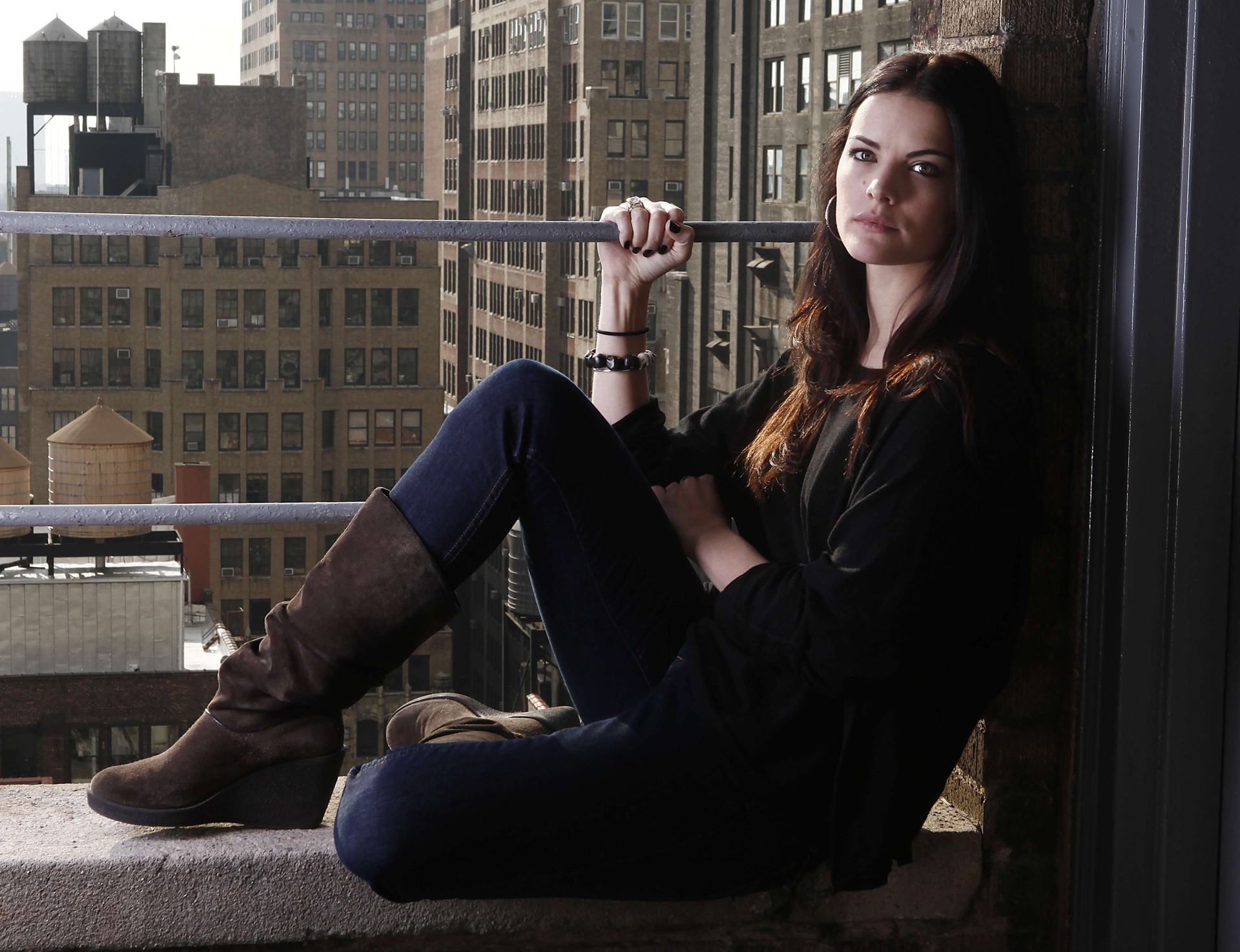 Jaimie Alexander sitting on a ledge HD Wallpaper