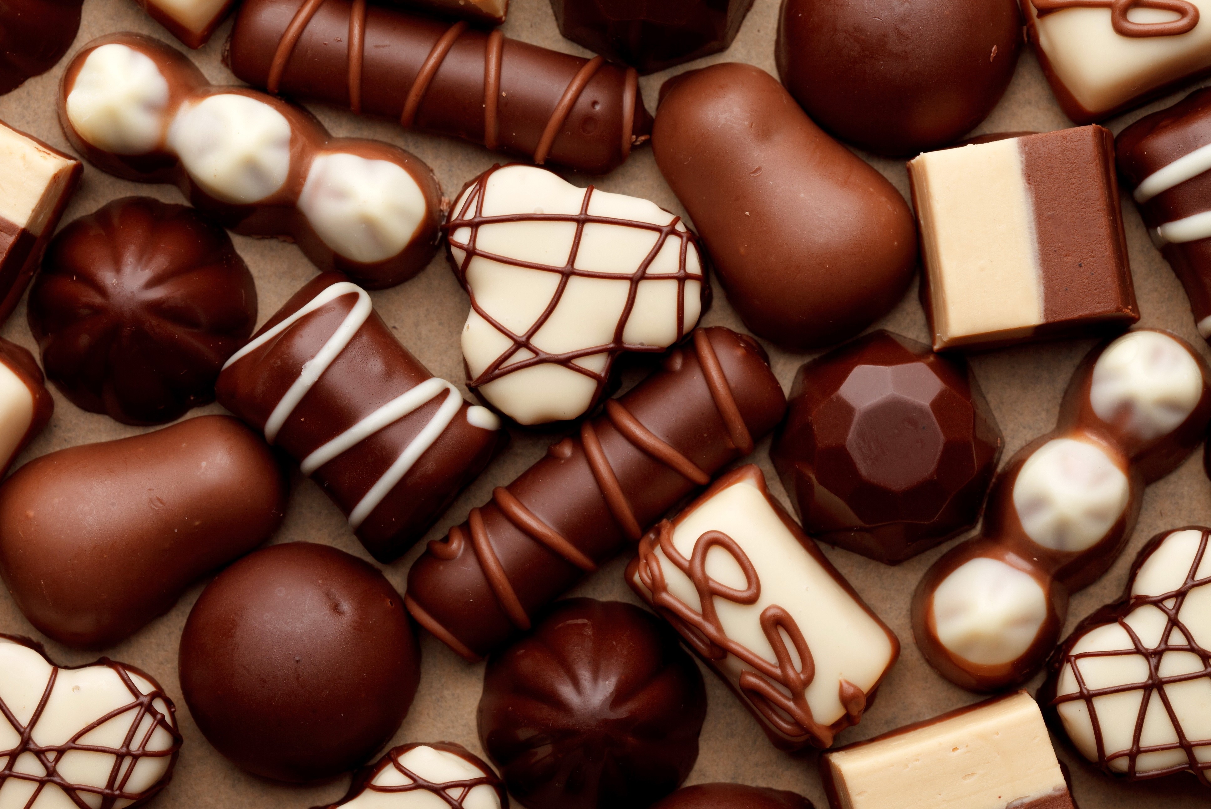 Assortment of chocolates and candies HD Wallpaper