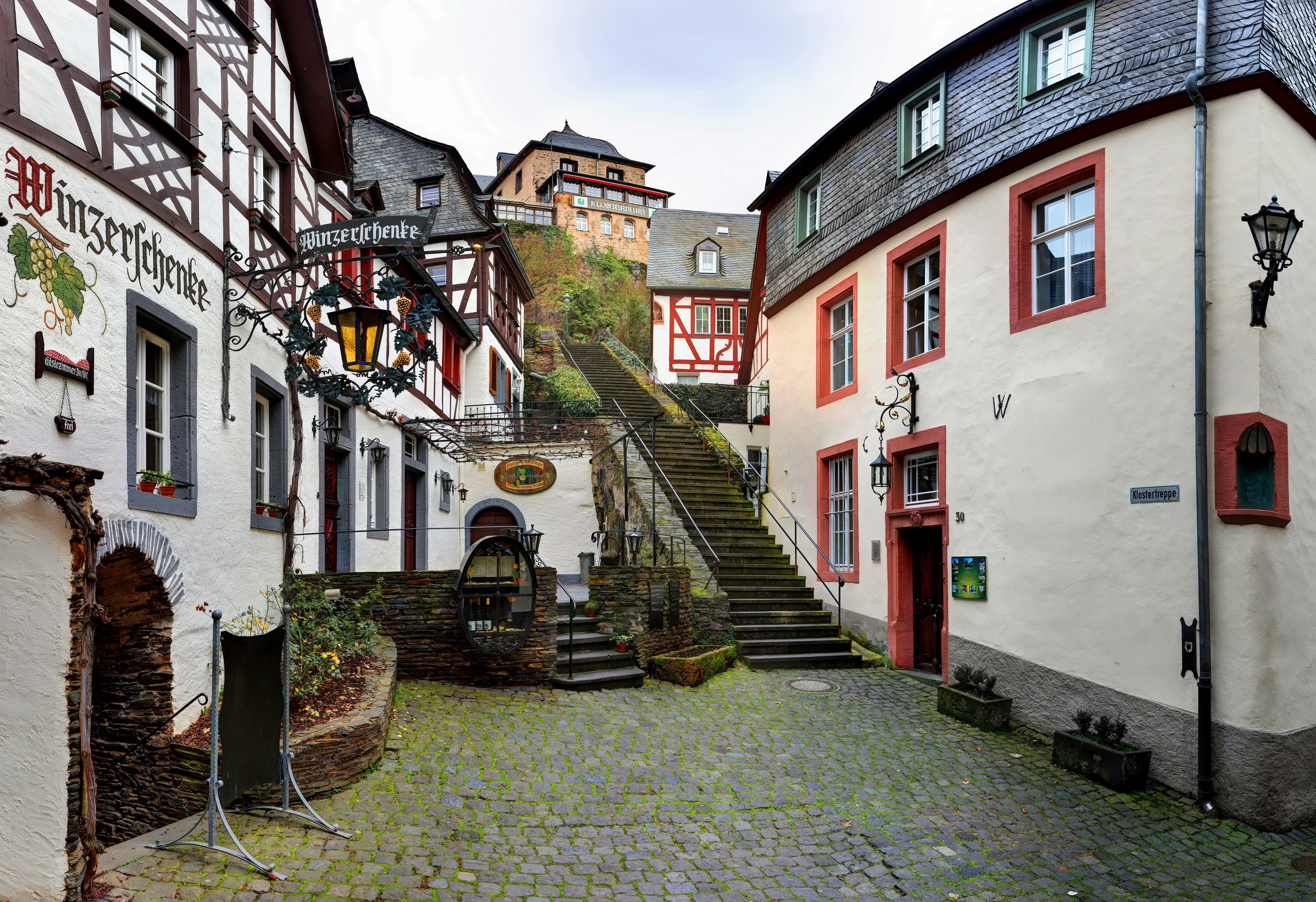 Street with stairs and half-timbered houses in Beilstein, Germany HD Wallpaper