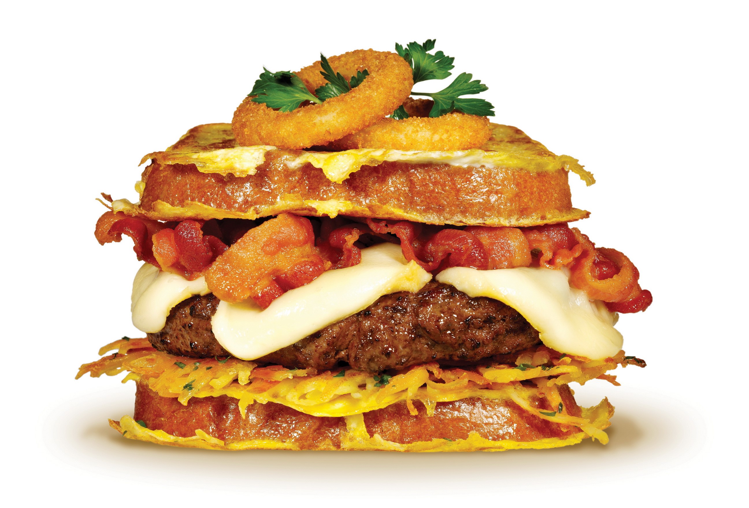 Hamburger with bacon, cheese, onion rings, and hash browns HD Wallpaper