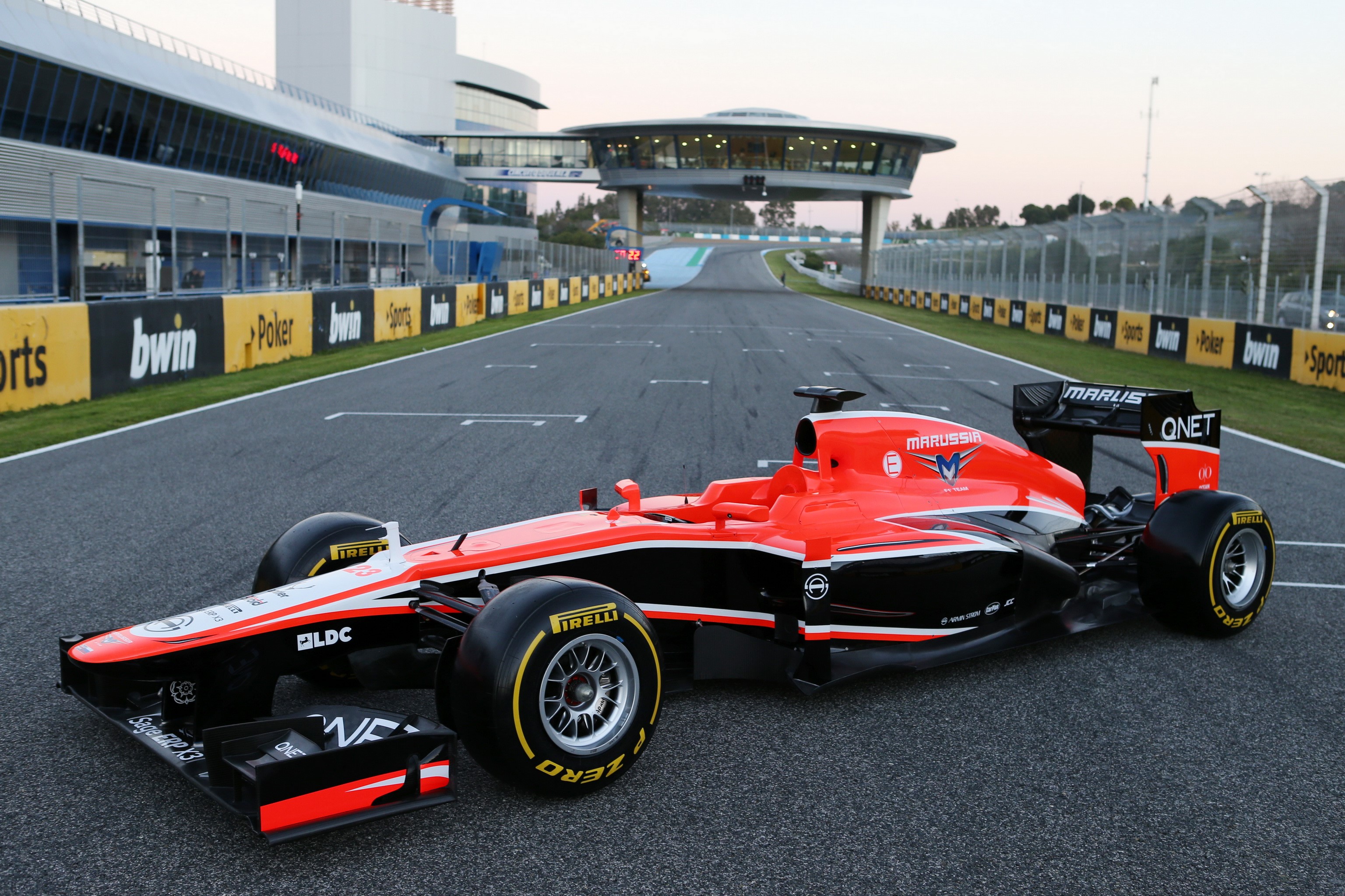 Marussia MR02 Formula 1 car on a race track HD Wallpaper