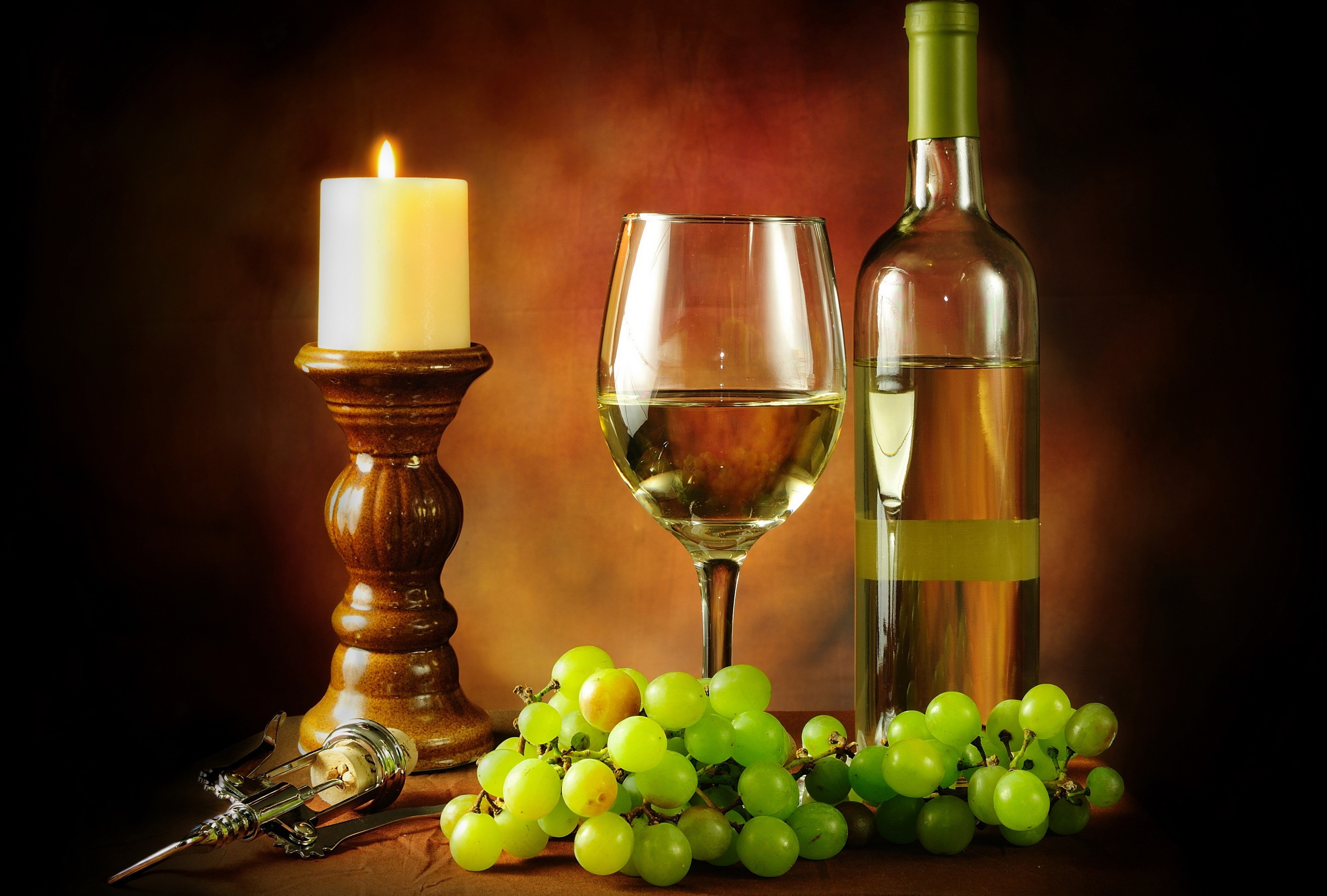 Still-life with white wine, grapes, candle, and corkscrew HD Wallpaper