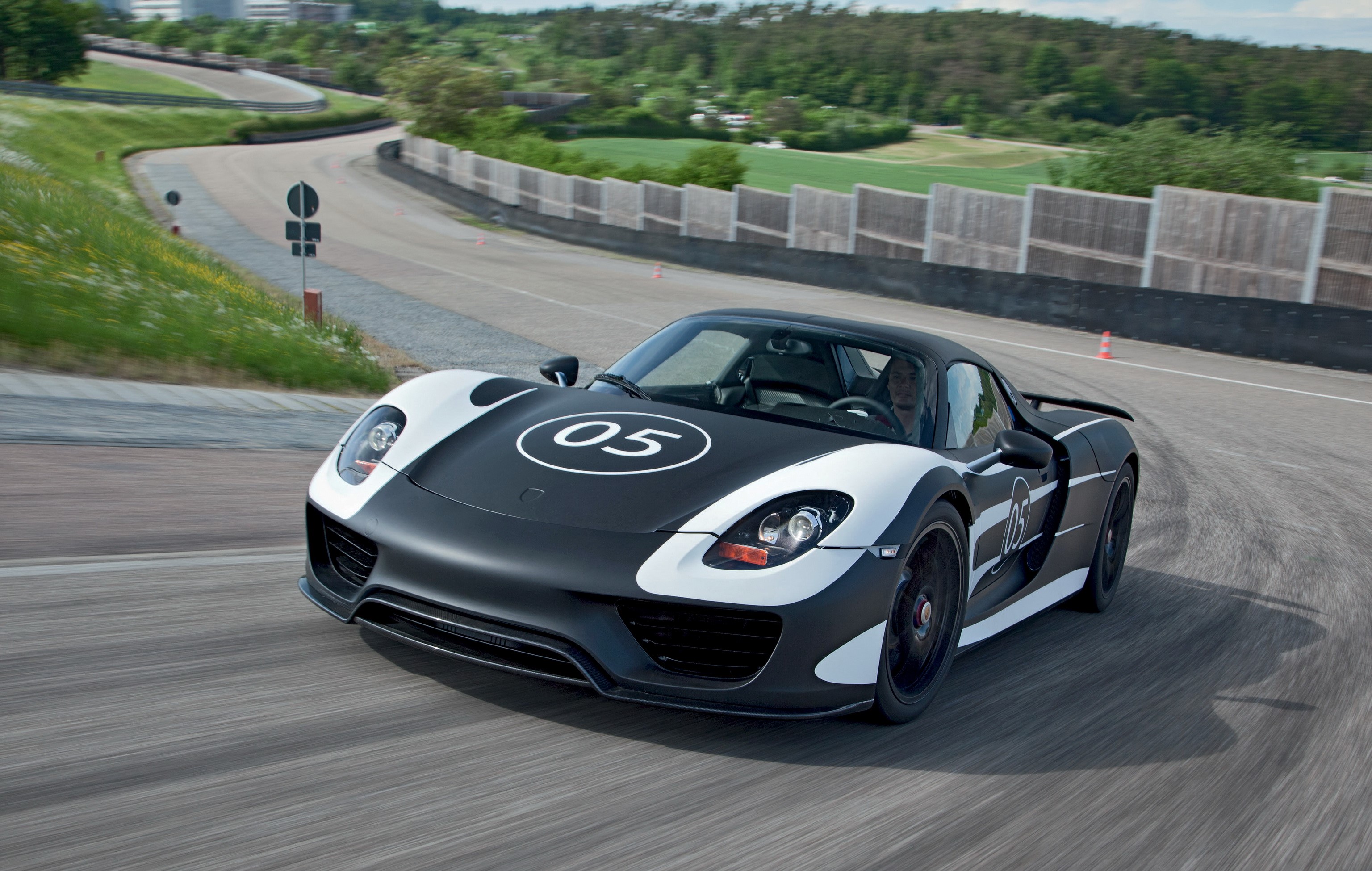 Porsche 918 Spyder on a race track HD Wallpaper