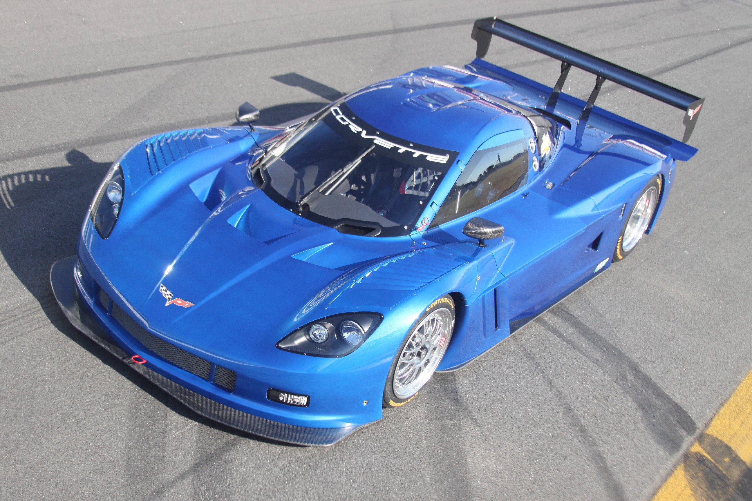 Blue 2012 Corvette Daytona race car on track HD Wallpaper