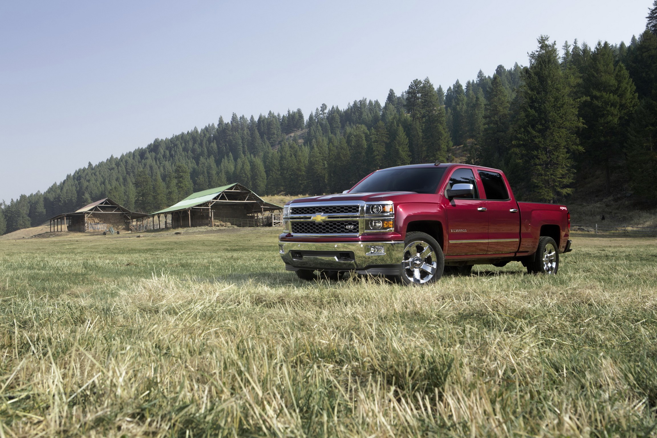 Red Chevrolet Silverado LTZ truck in a field HD Wallpaper