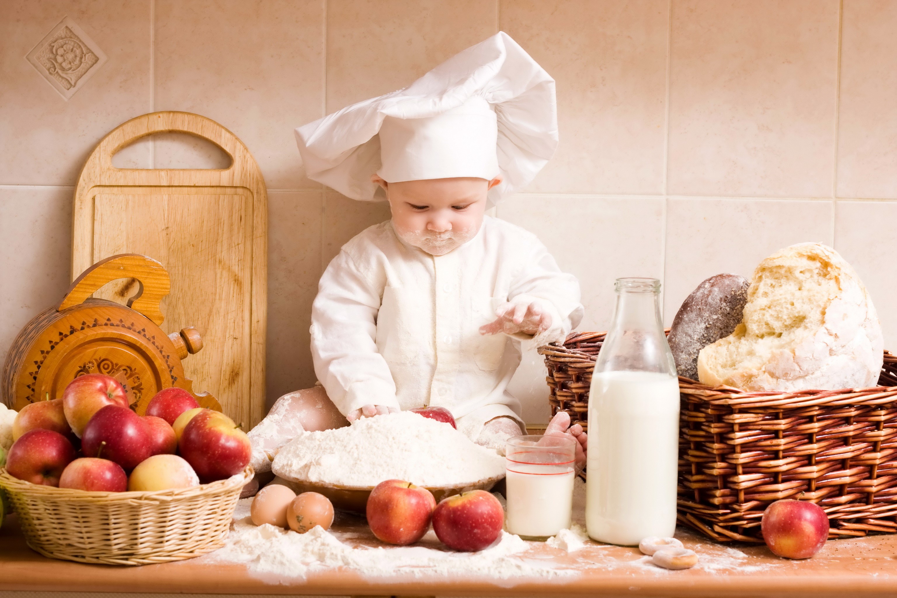 Baby chef with apples, milk, and bread HD Wallpaper