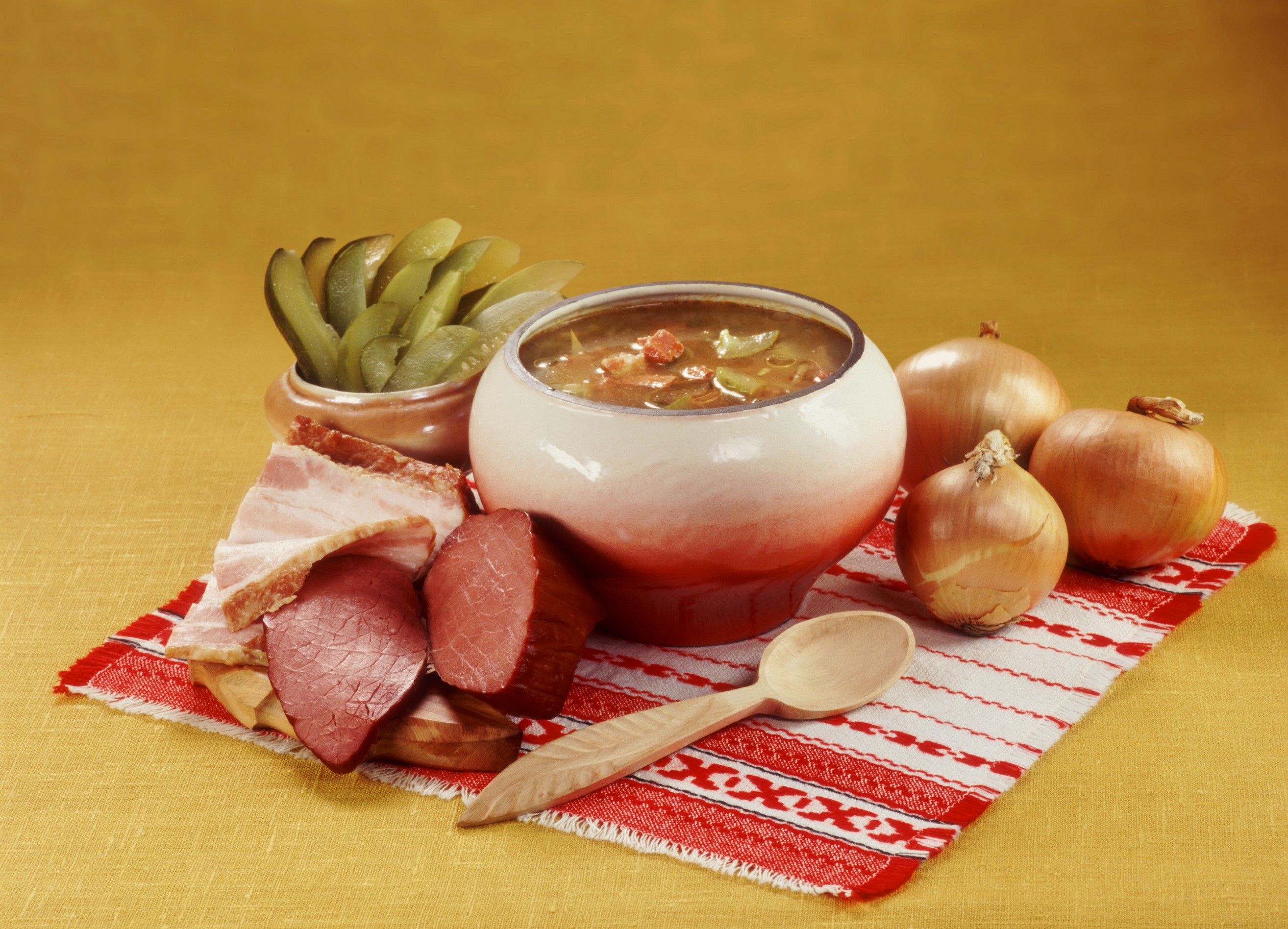 Still life with soup, pickles, meat, onions, and spoon HD Wallpaper