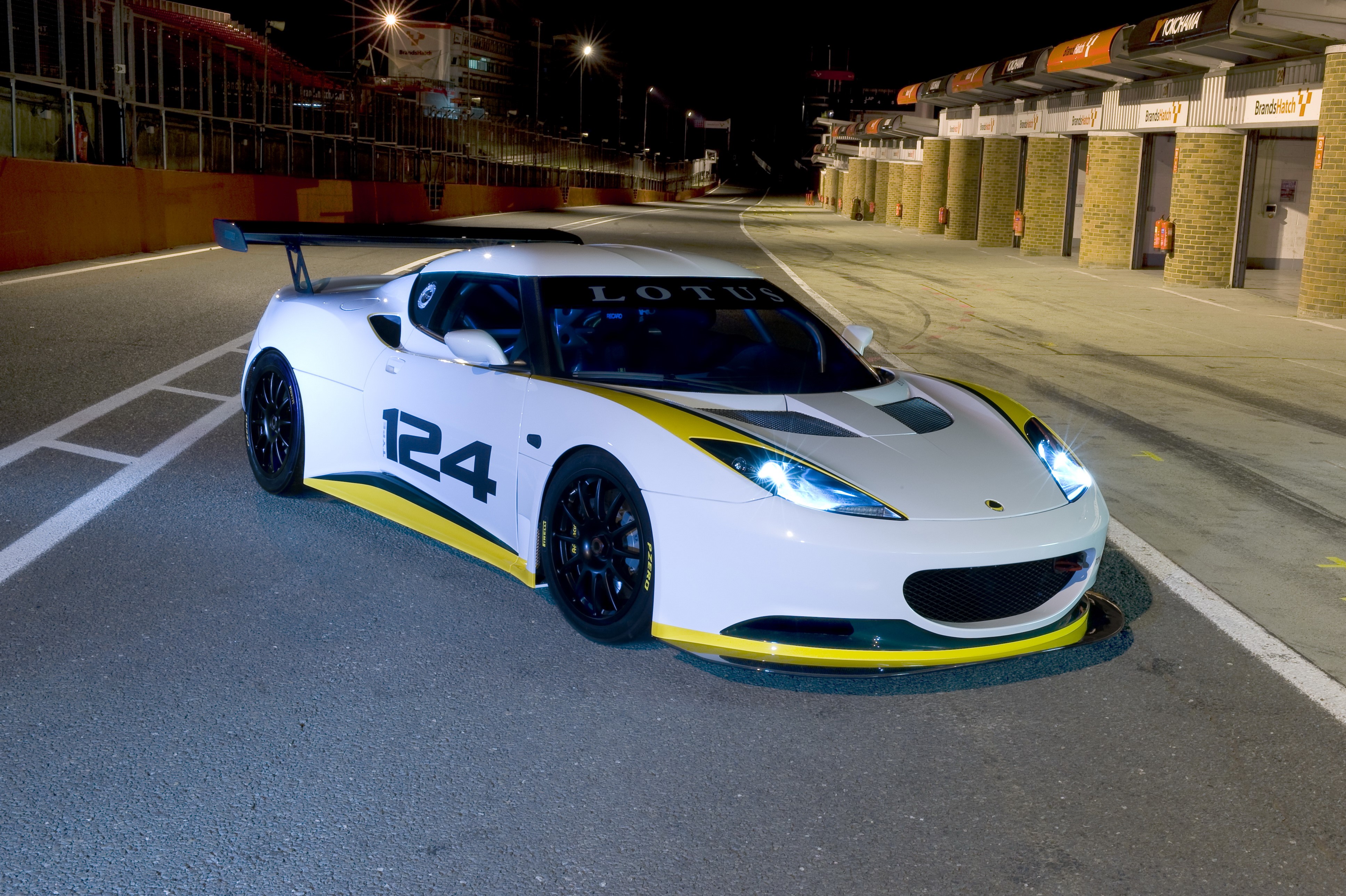 White Lotus Evora Type 124 Endurance Racecar at Night HD Wallpaper