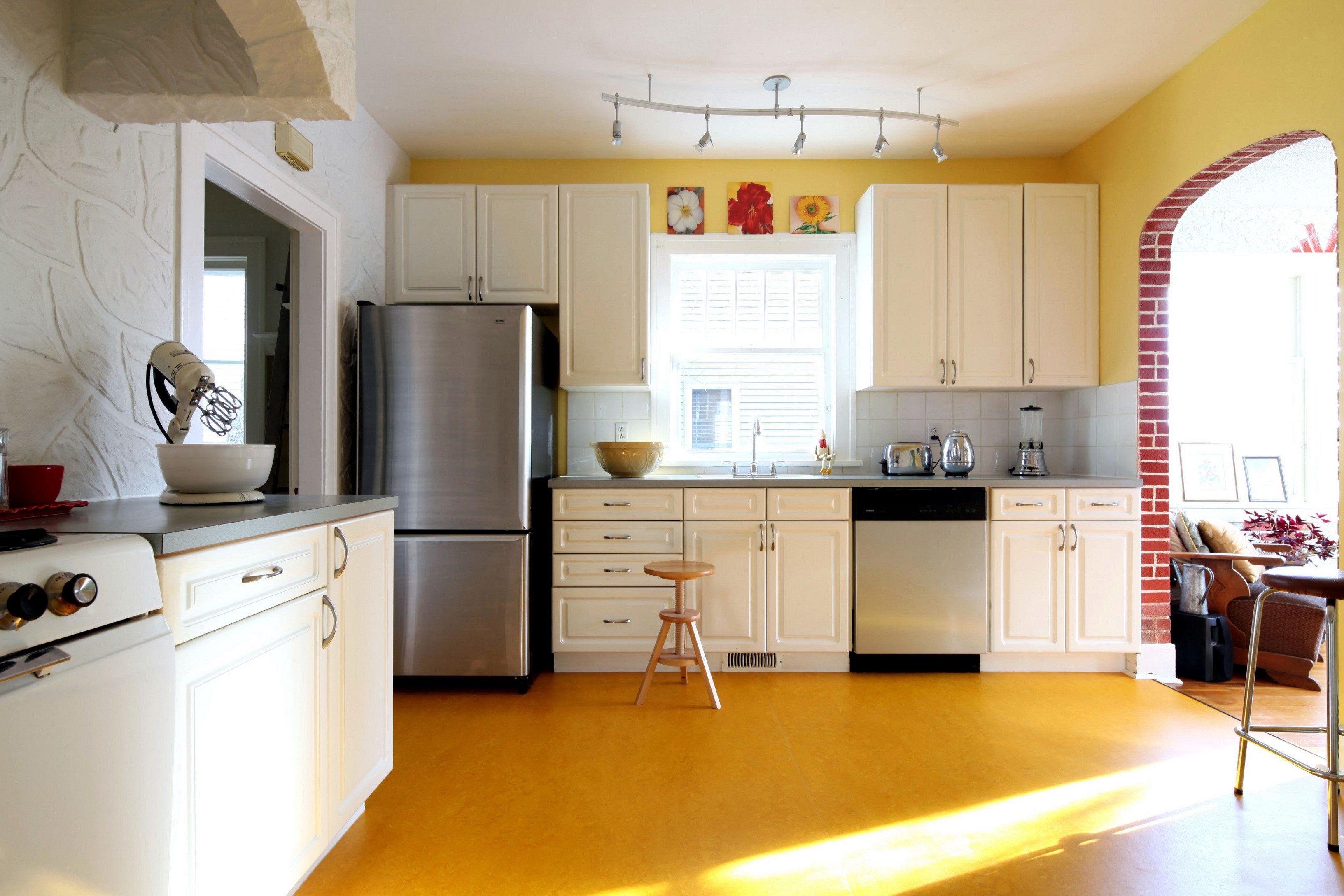 Kitchen with yellow walls and floor HD Wallpaper