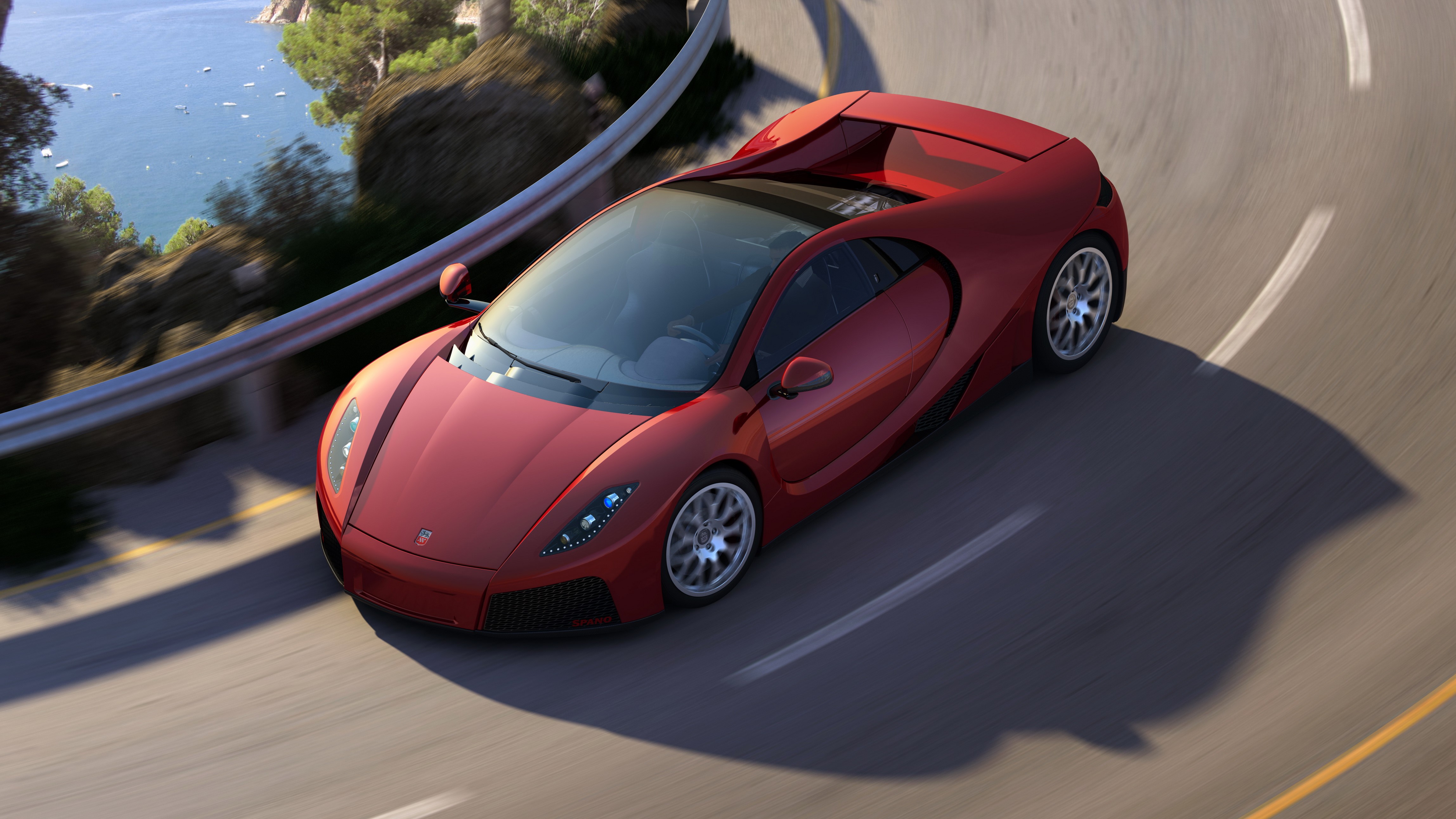Red 2012 GTA Spano driving on a coastal road HD Wallpaper