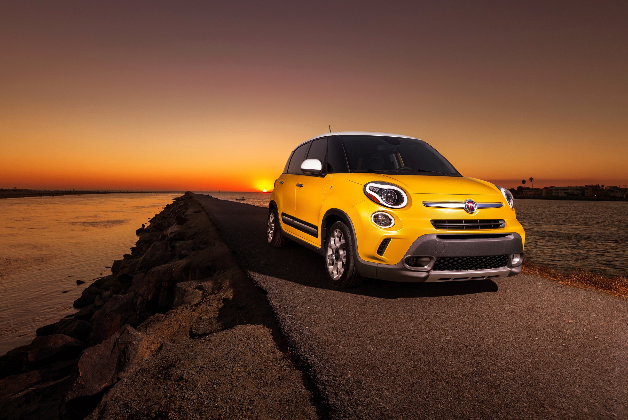 Yellow Fiat 500L Trekking on a road at sunset HD Wallpaper