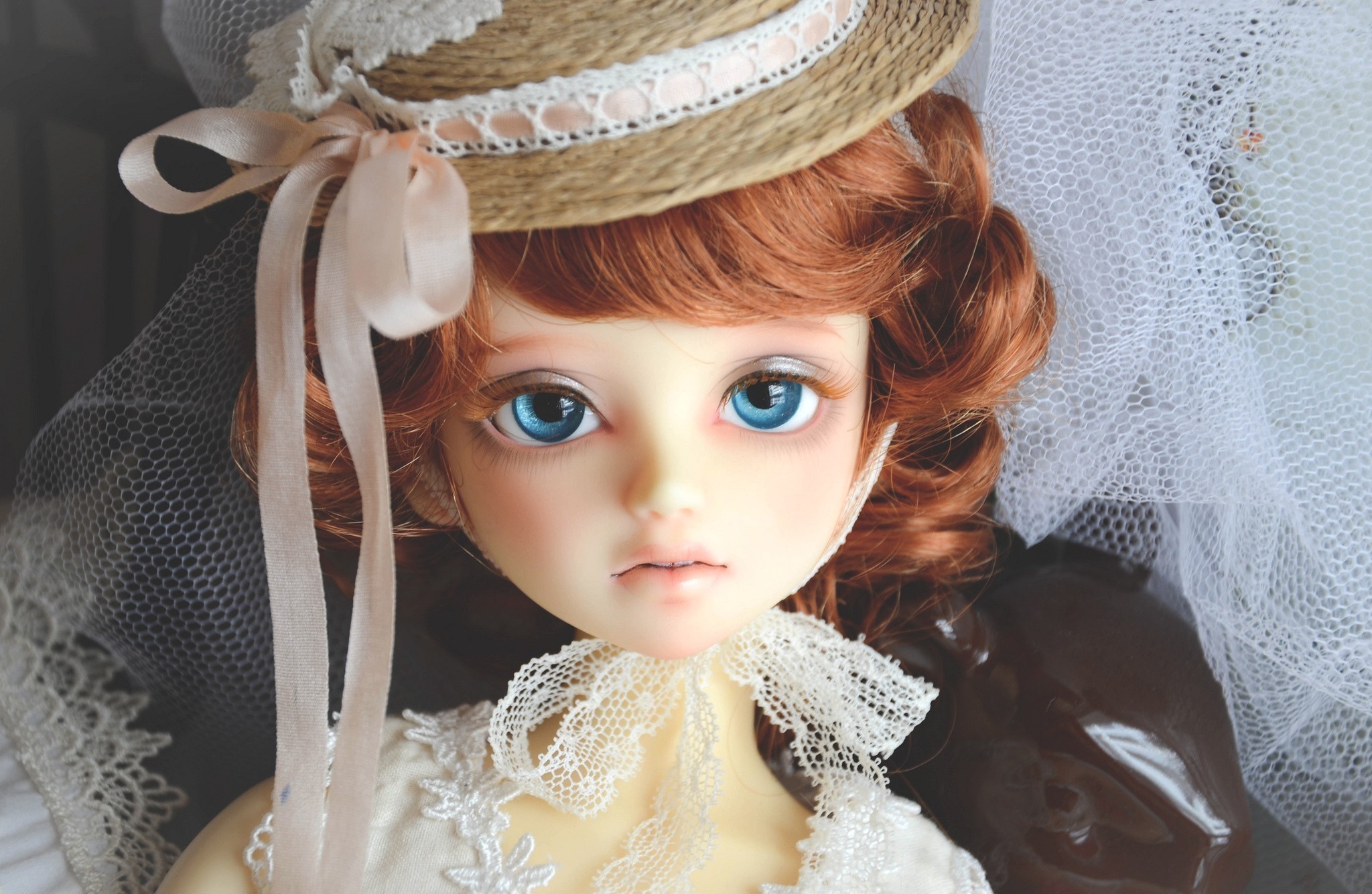 Doll with red hair wearing a straw hat and lace dress HD Wallpaper