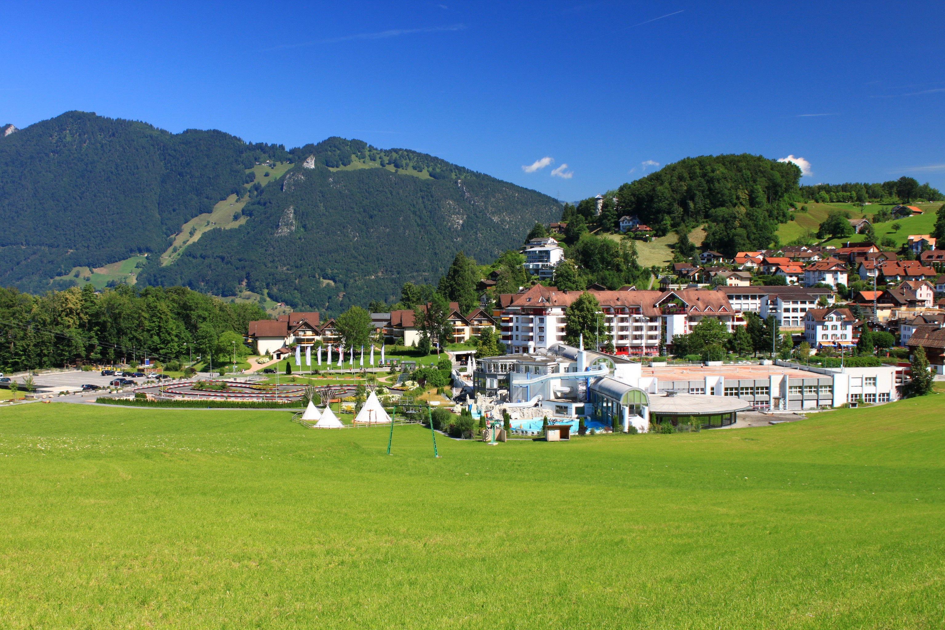 Morschach, Switzerland with mountains and green fields HD Wallpaper
