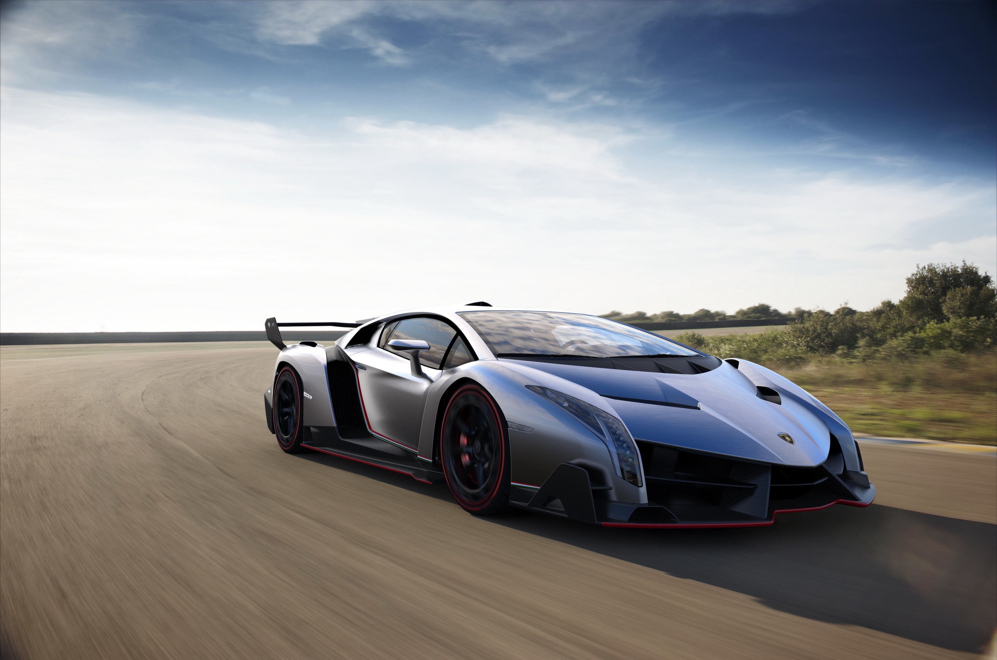 Lamborghini Veneno driving on a track HD Wallpaper