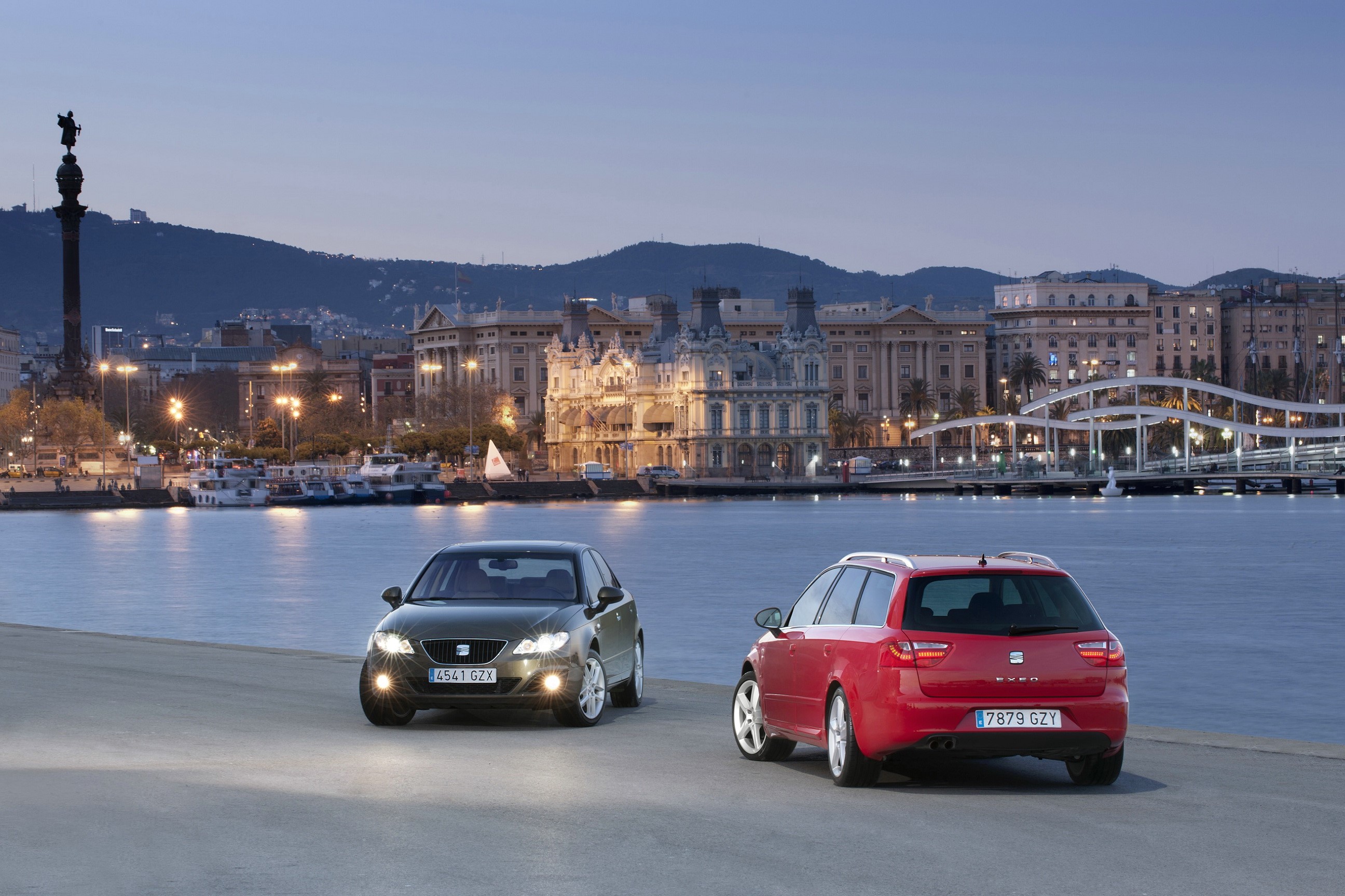 Two Seat Exeo ST cars parked by the water in Barcelona HD Wallpaper