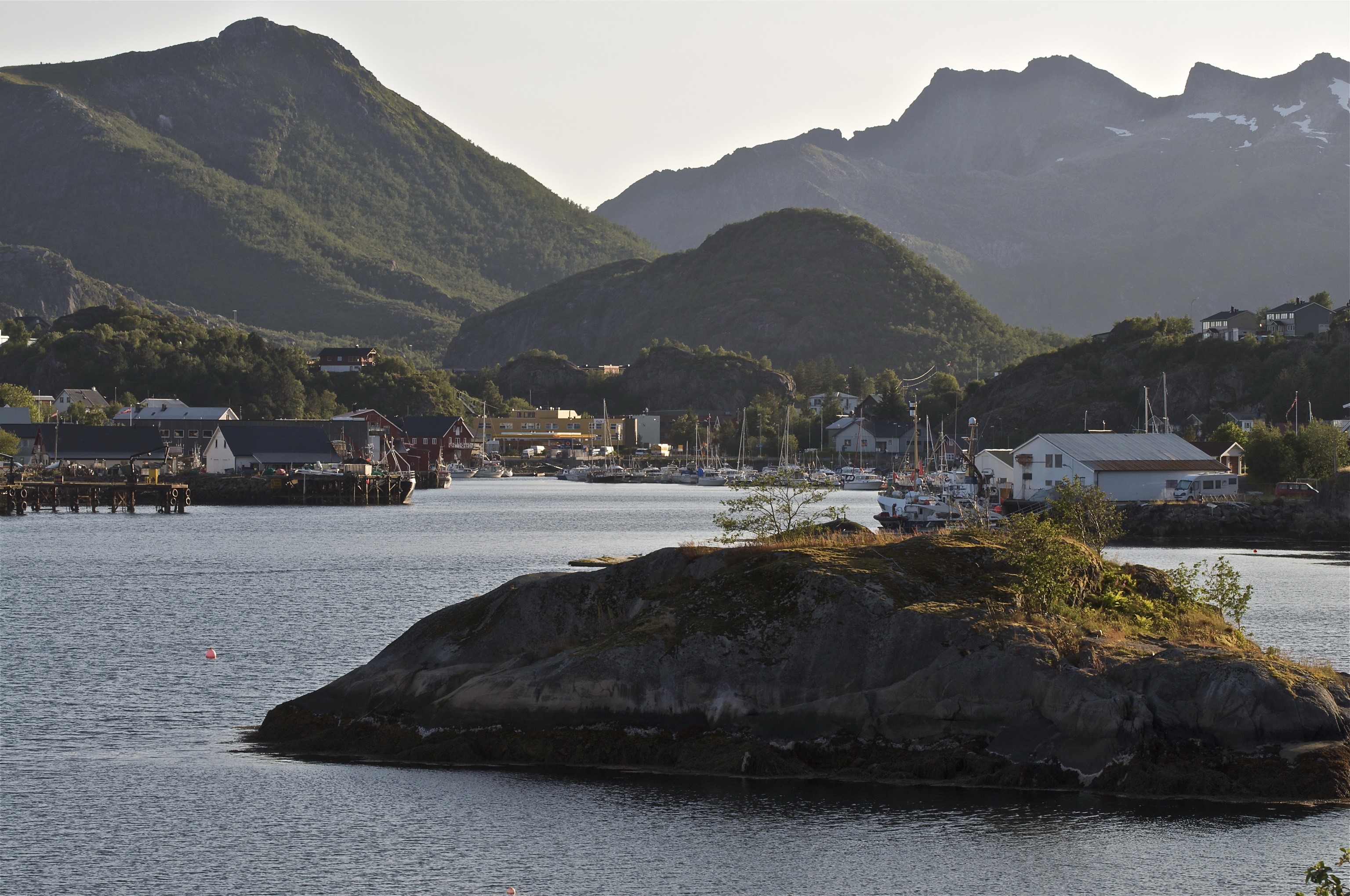 Fishing village in Lofoten, Norway with mountains HD Wallpaper