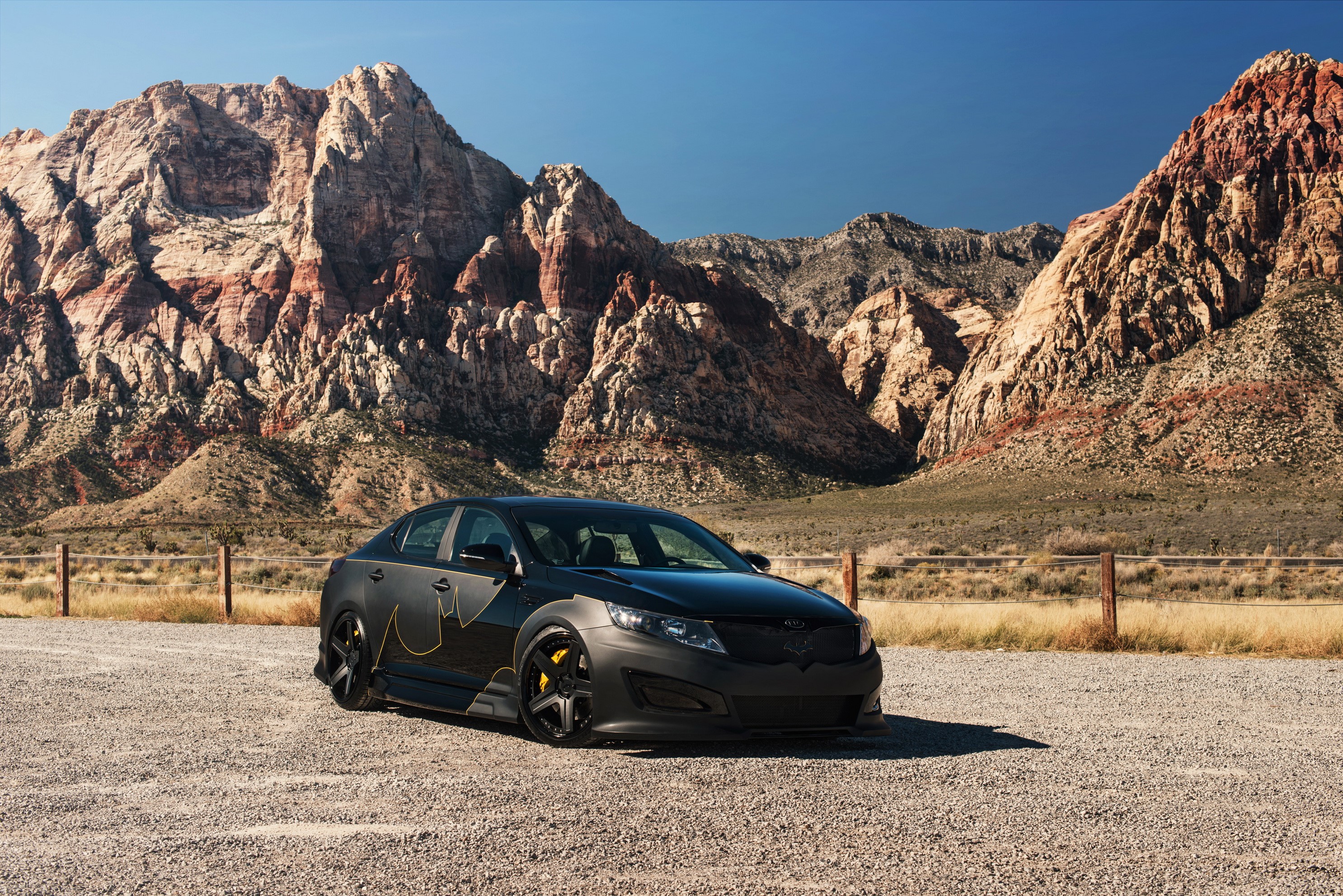 Batman Kia Optima in front of Red Rock Canyon mountains HD Wallpaper