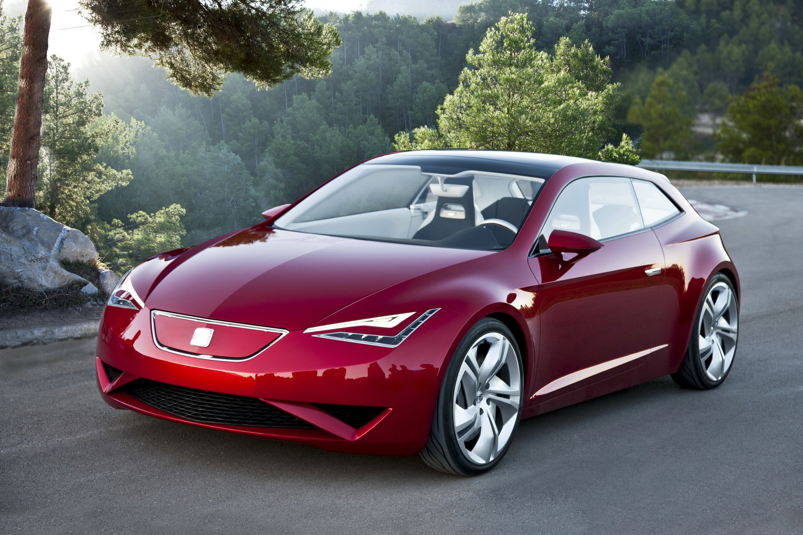 Red Seat IBE concept car on a road HD Wallpaper