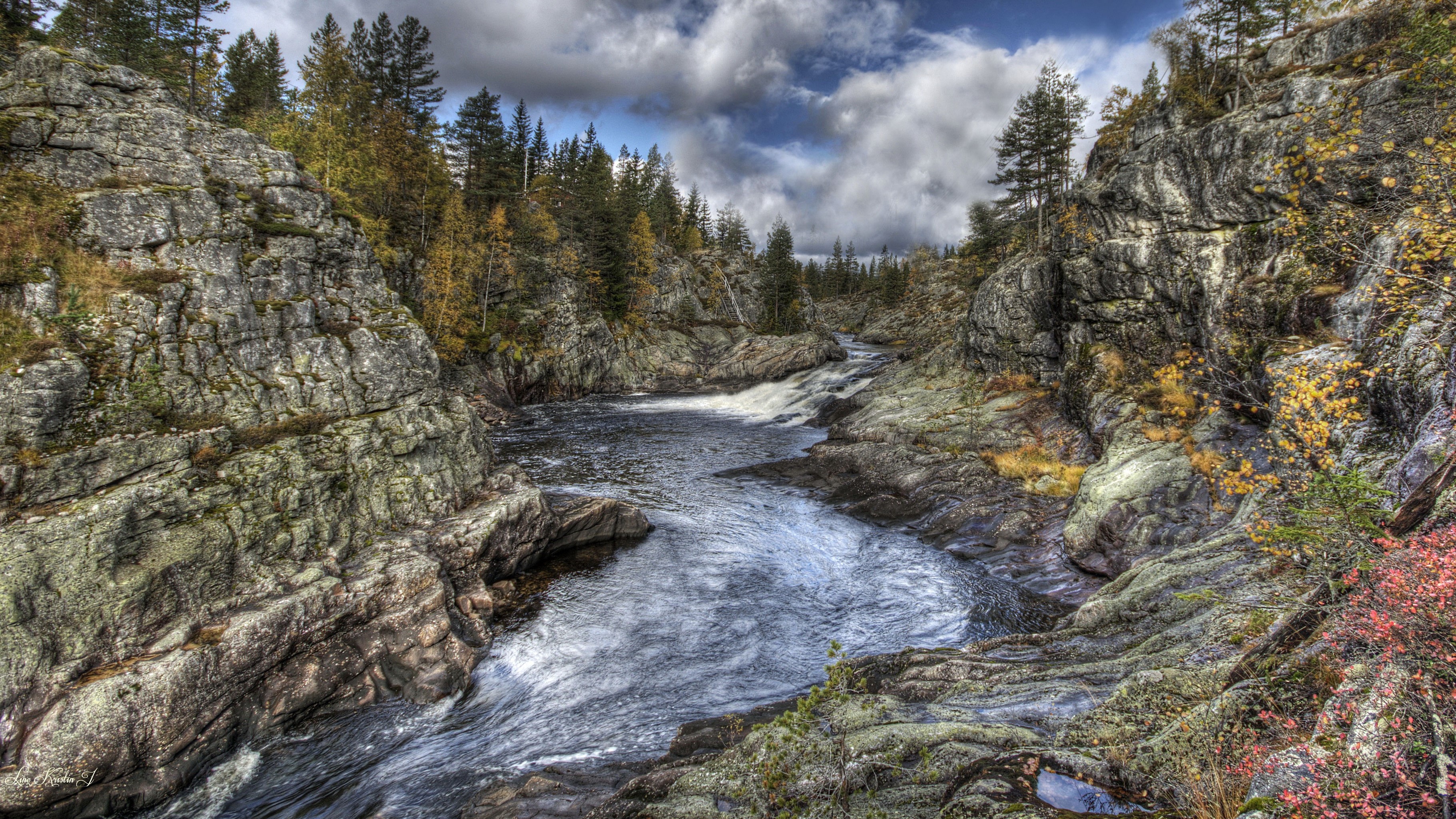 River flowing through rocky gorge in Tuddal, Norway HD Wallpaper