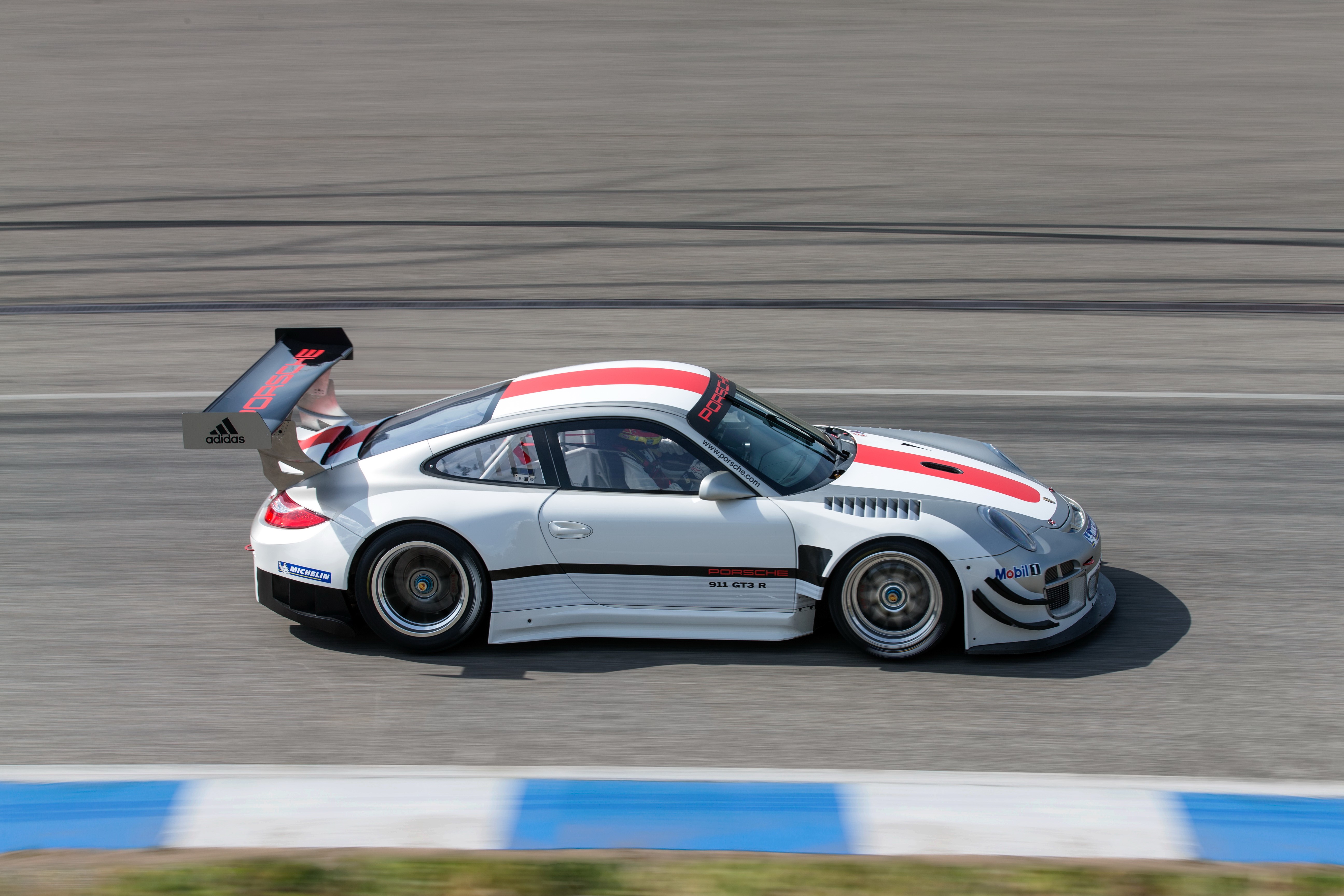 White Porsche 911 GT3 R race car on track HD Wallpaper