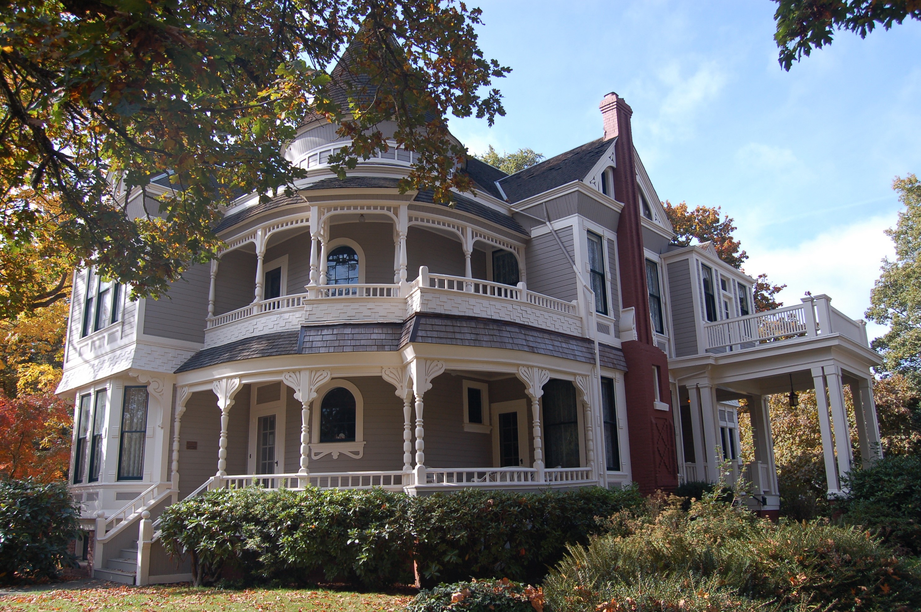Victorian Mansion with Wrap-around Porch in Autumn HD Wallpaper