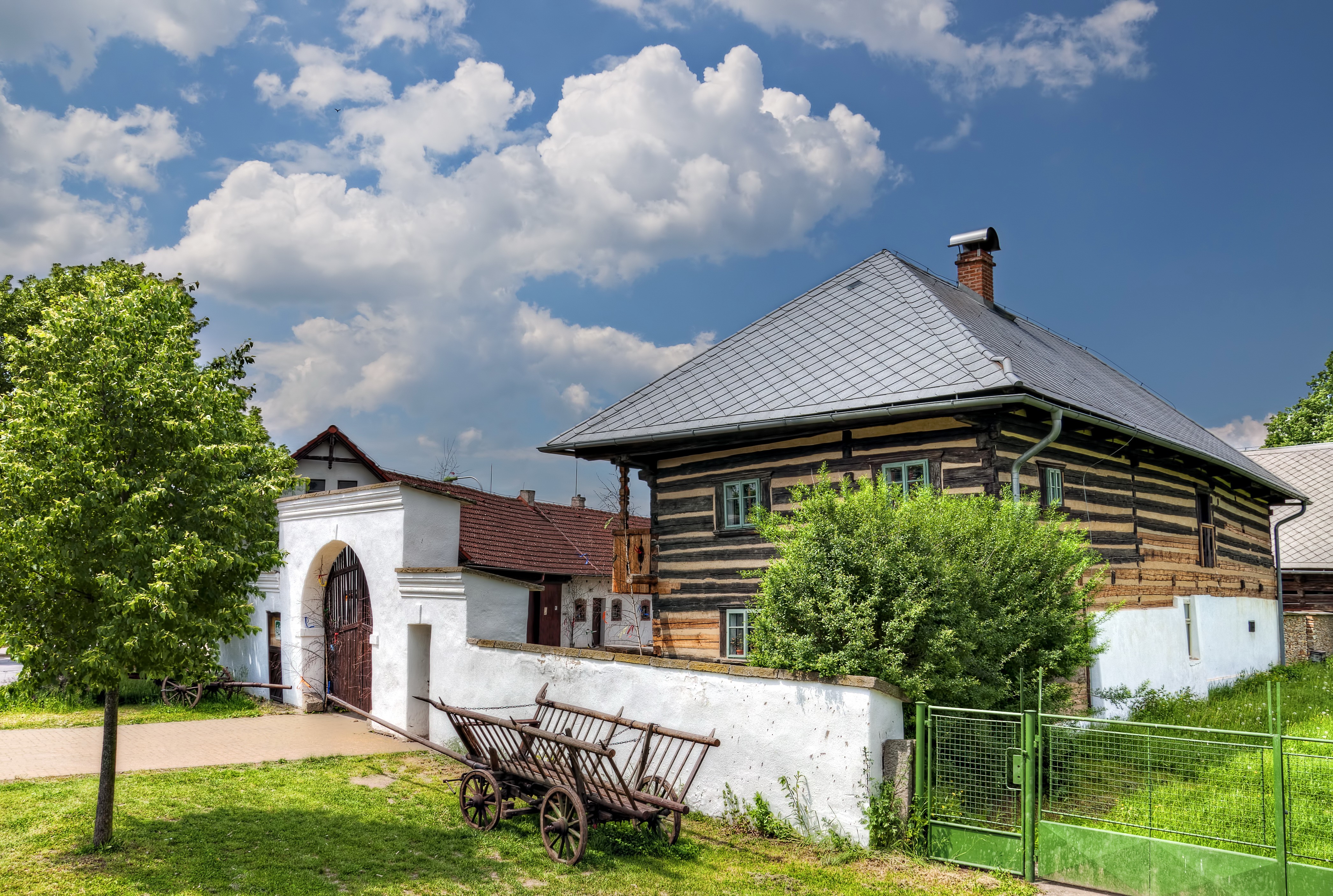 4K Piletice Czech Republic Houses with Clouds HD Wallpaper