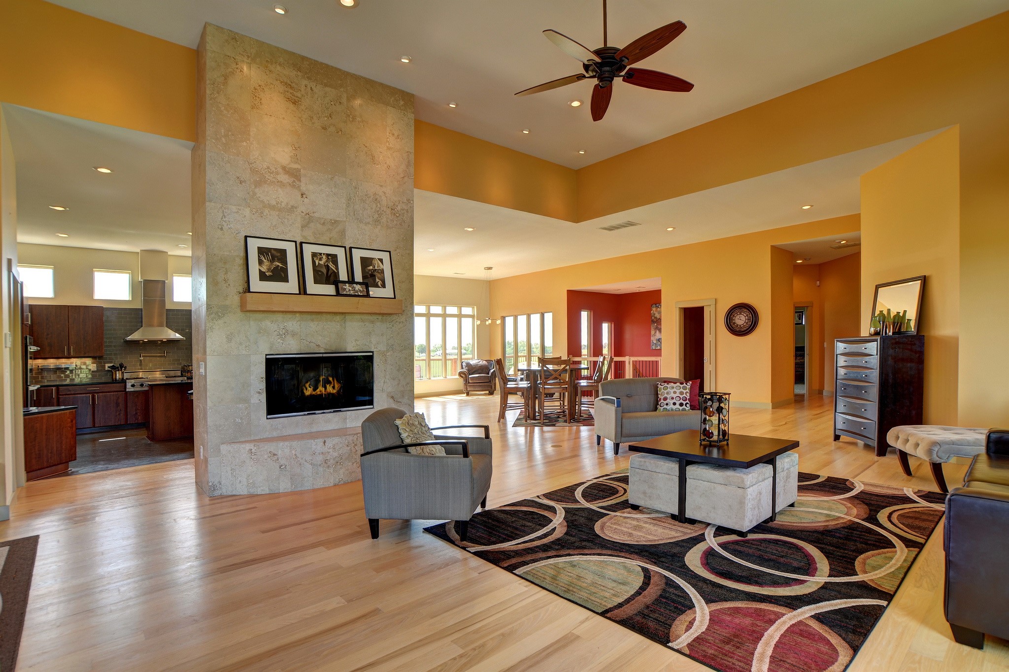 Modern living room with fireplace and open kitchen HD Wallpaper