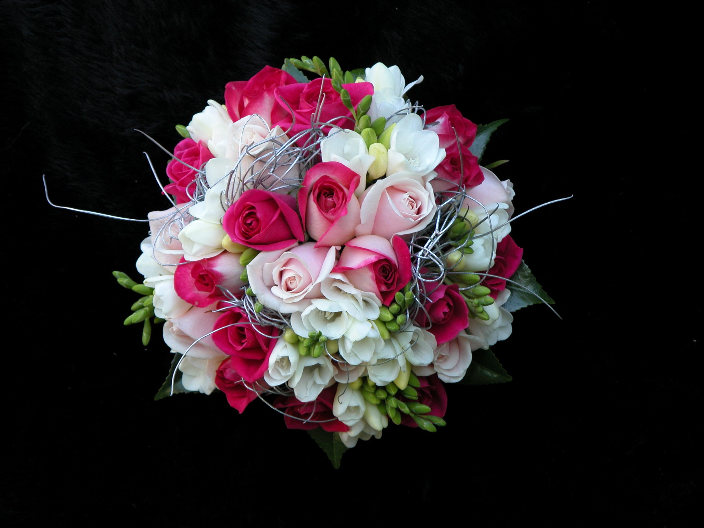 Bouquet of pink, white, and fuchsia roses with silver accents HD Wallpaper