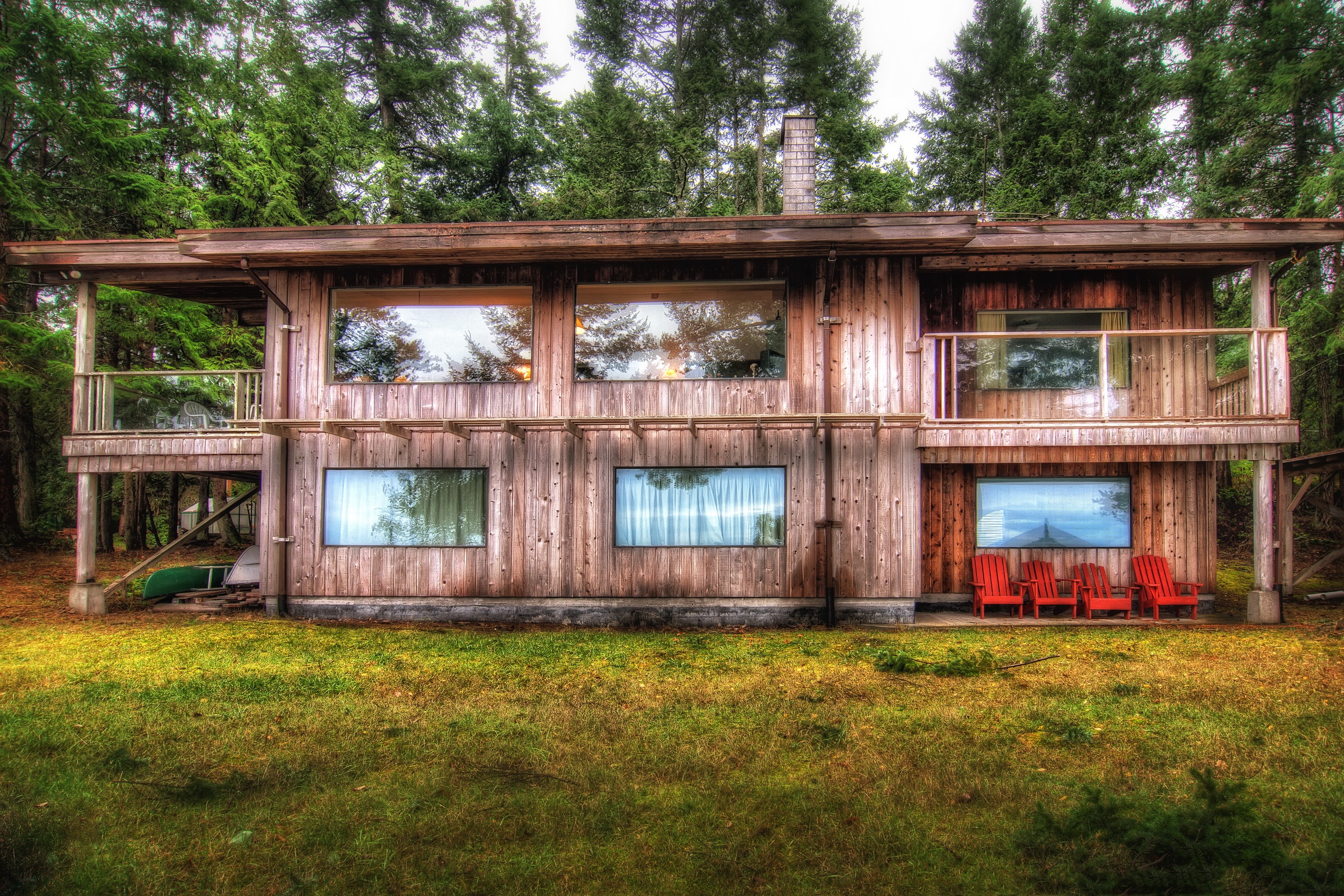 Wooden house with large windows on Galiano Island, Canada HD Wallpaper