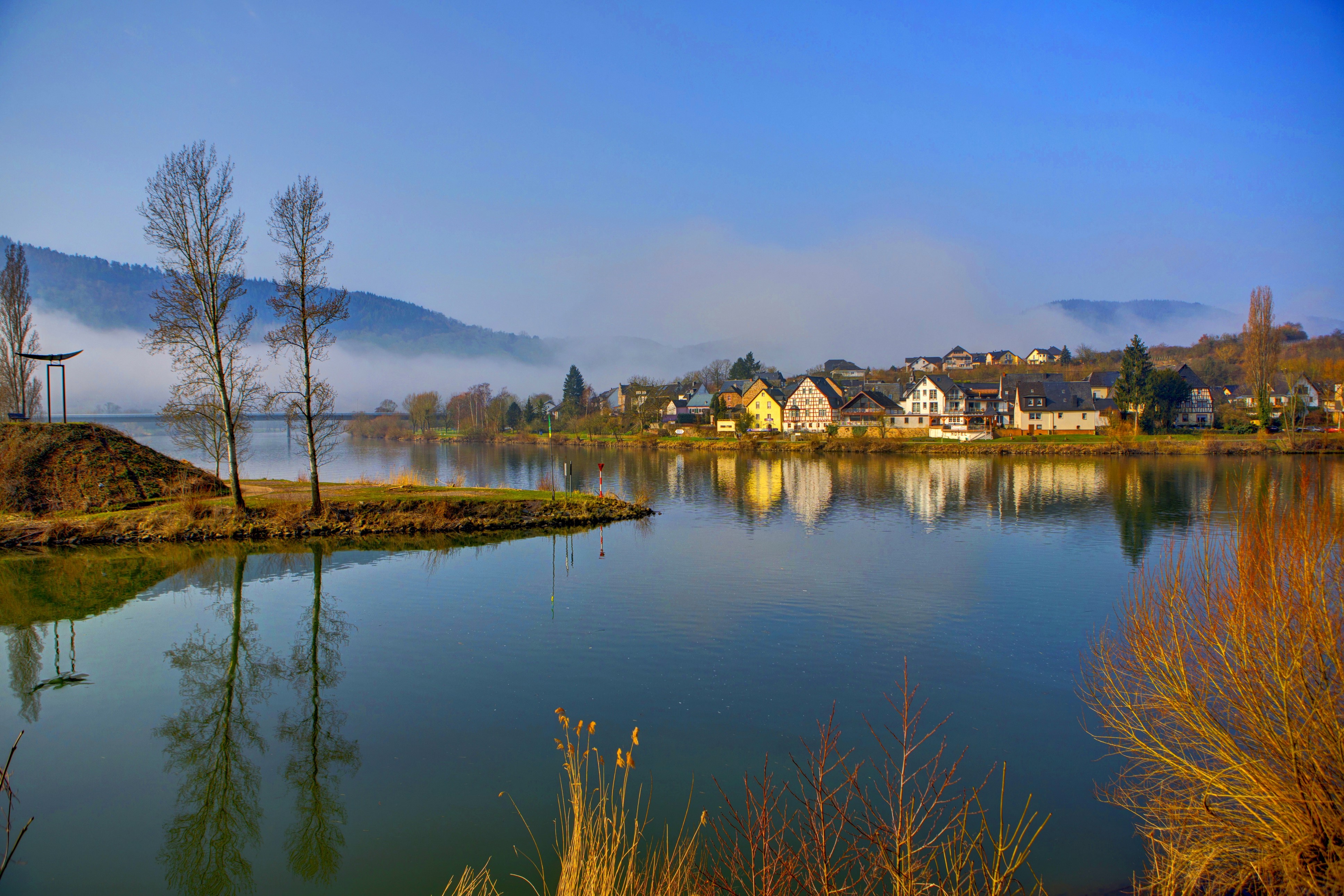 River town with misty hills in Sinsheim, Germany HD Wallpaper