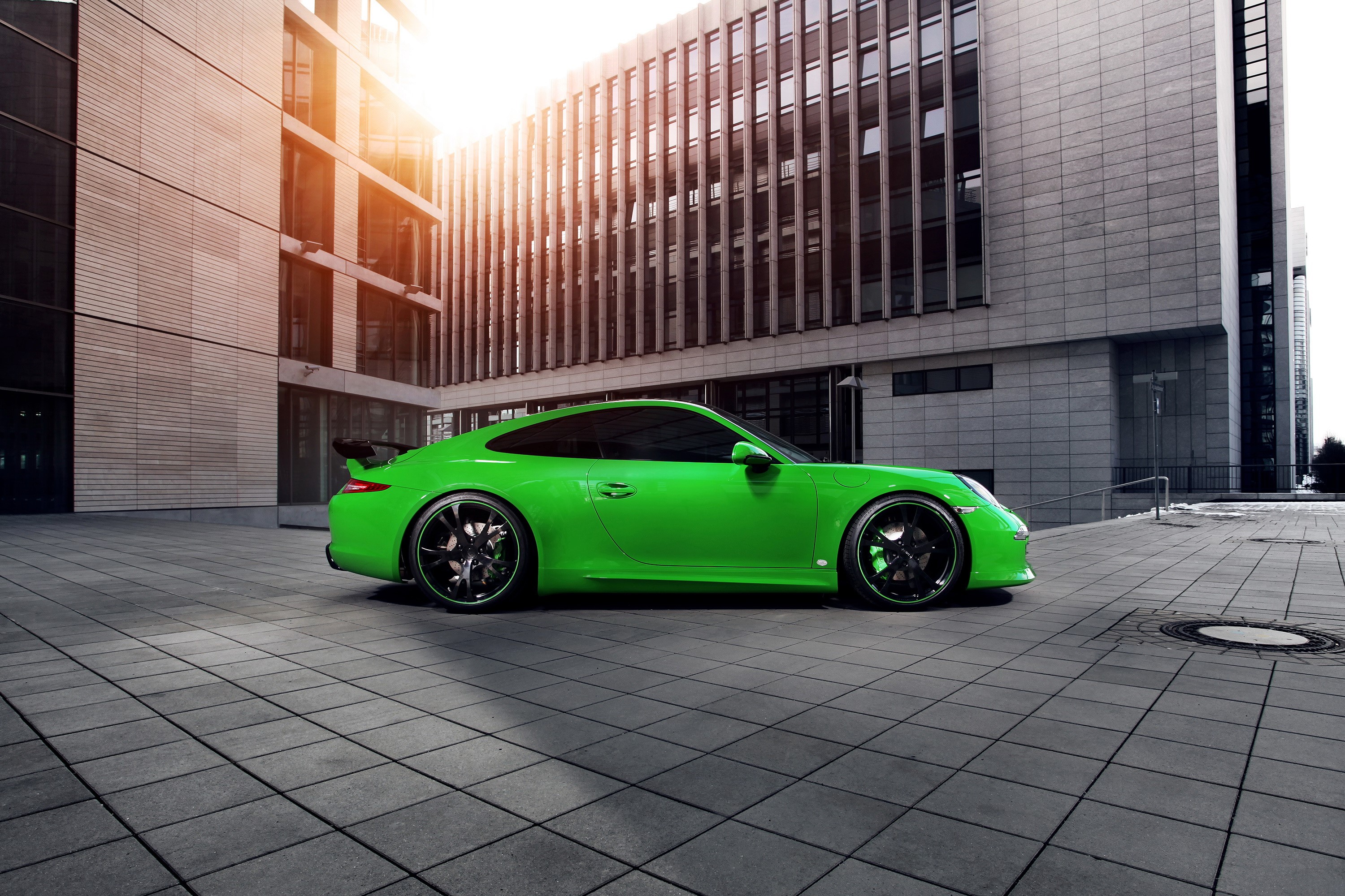 Green Porsche 911 (991) Carrera 4S parked on tiled ground HD Wallpaper