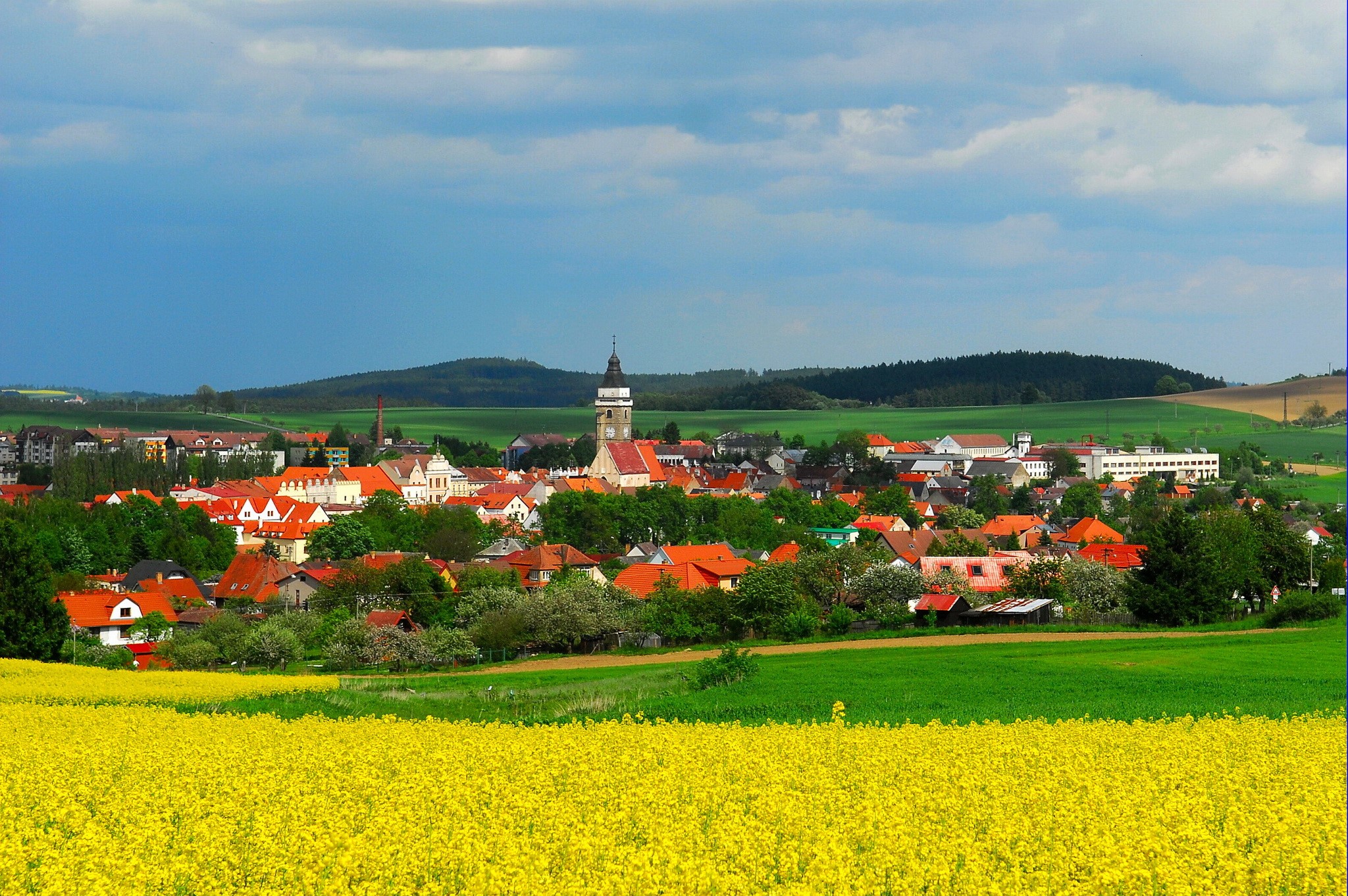 Townscape with a church tower and fields in Jindrichuv Hradec, Czech Republic HD Wallpaper