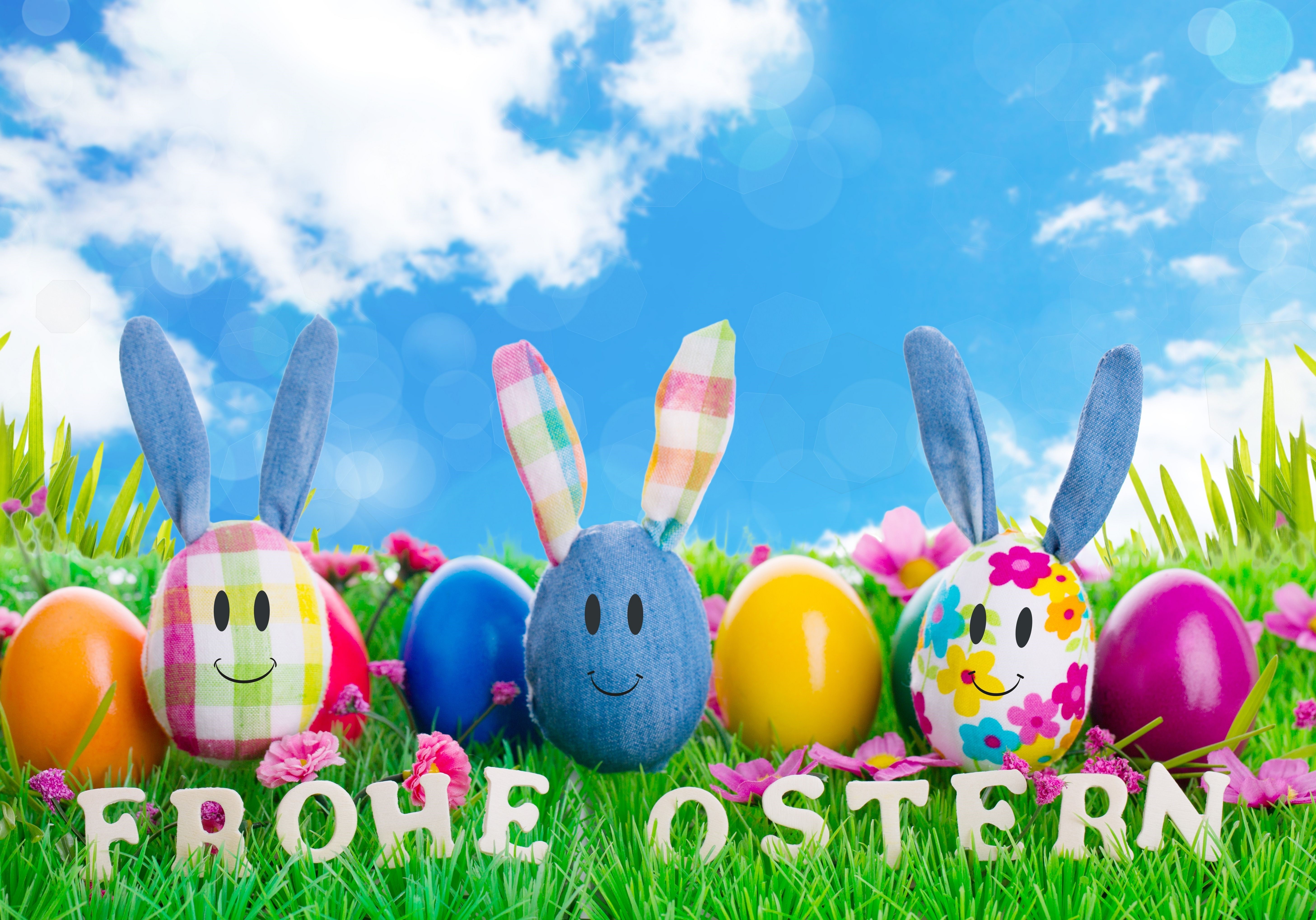 Easter Eggs with Bunny Ears and Frohe Ostern Text HD Wallpaper