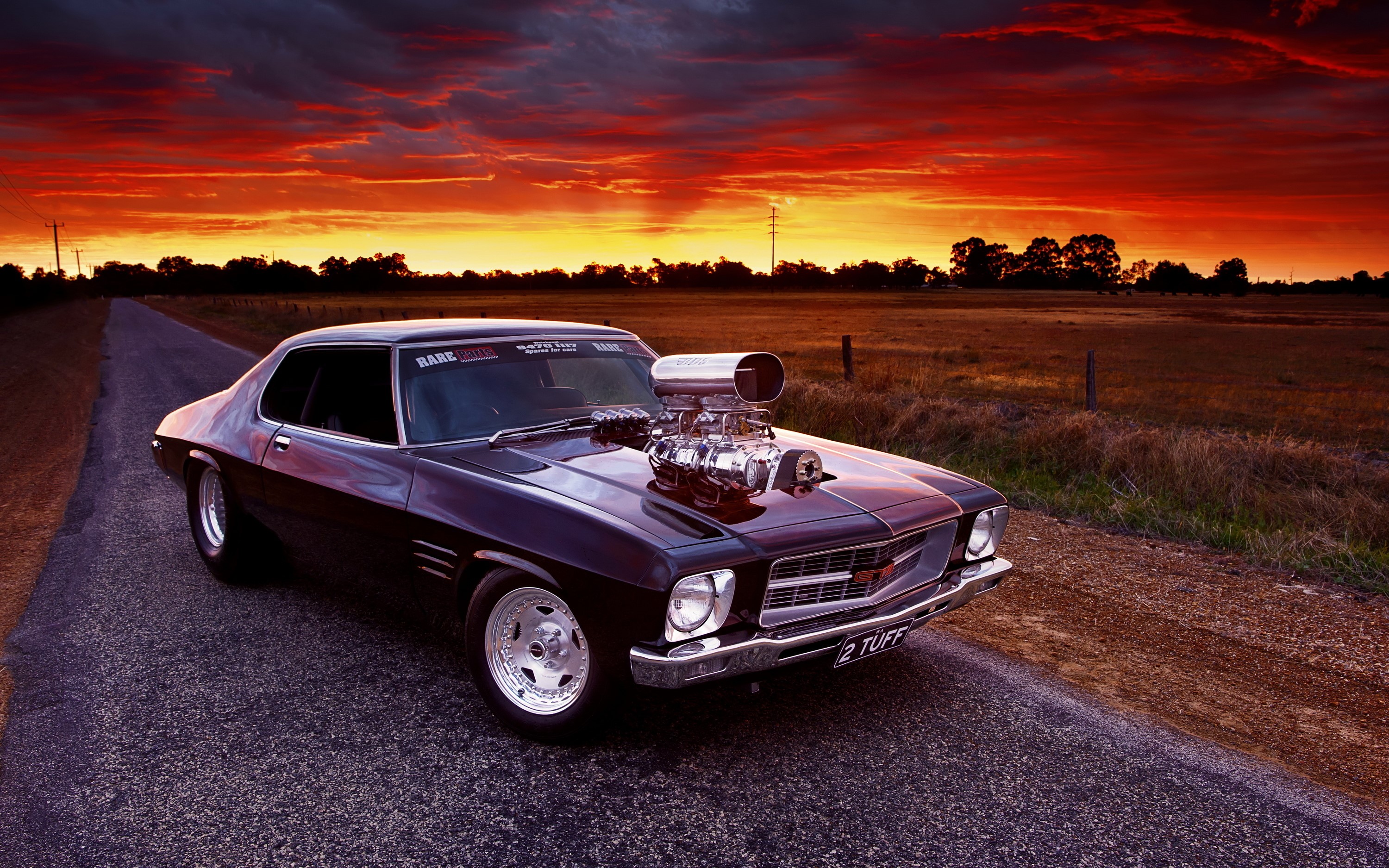 Modified Holden Monaro GTS with supercharger at sunset HD Wallpaper