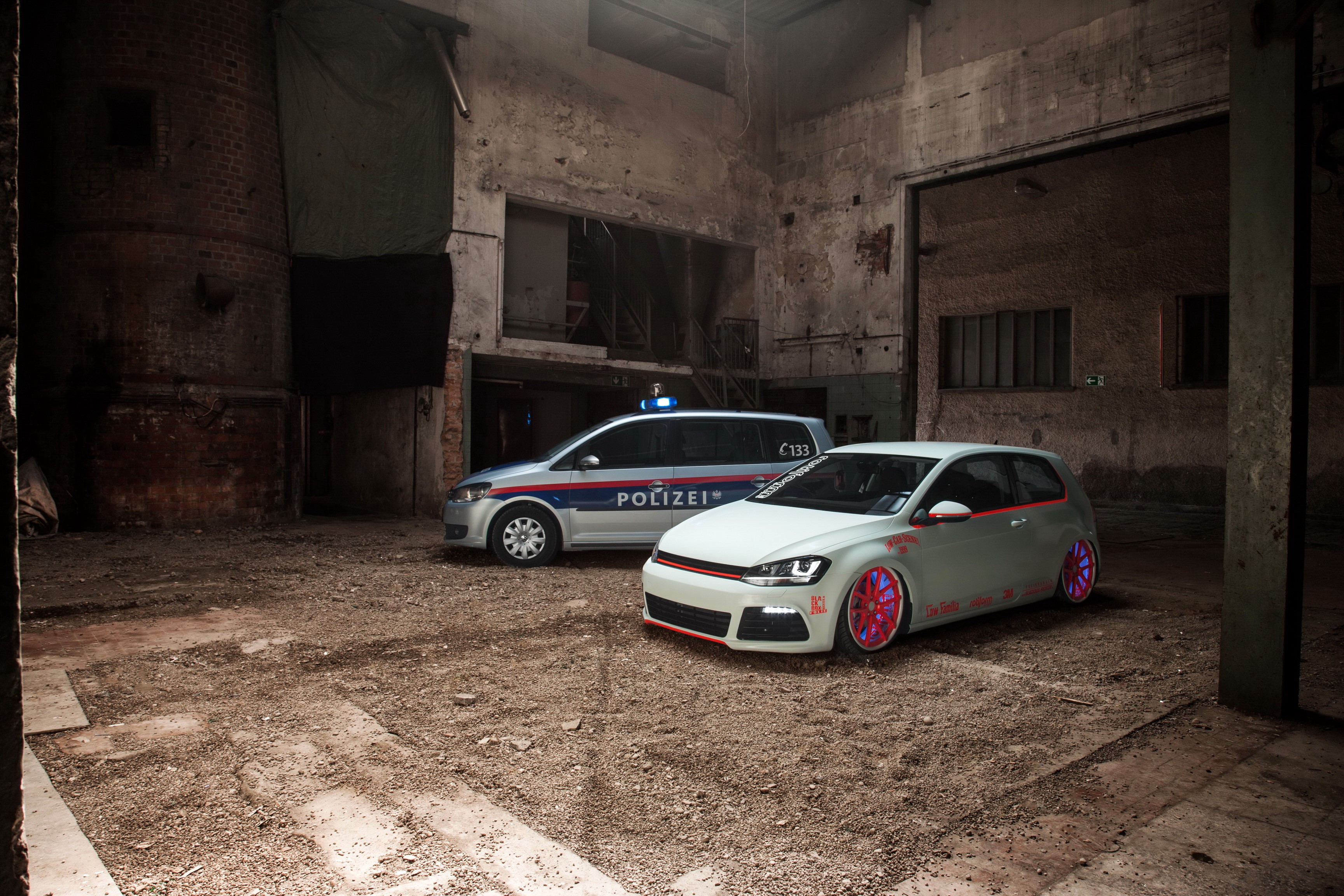 Volkswagen Golf VII and Police Car in Warehouse HD Wallpaper