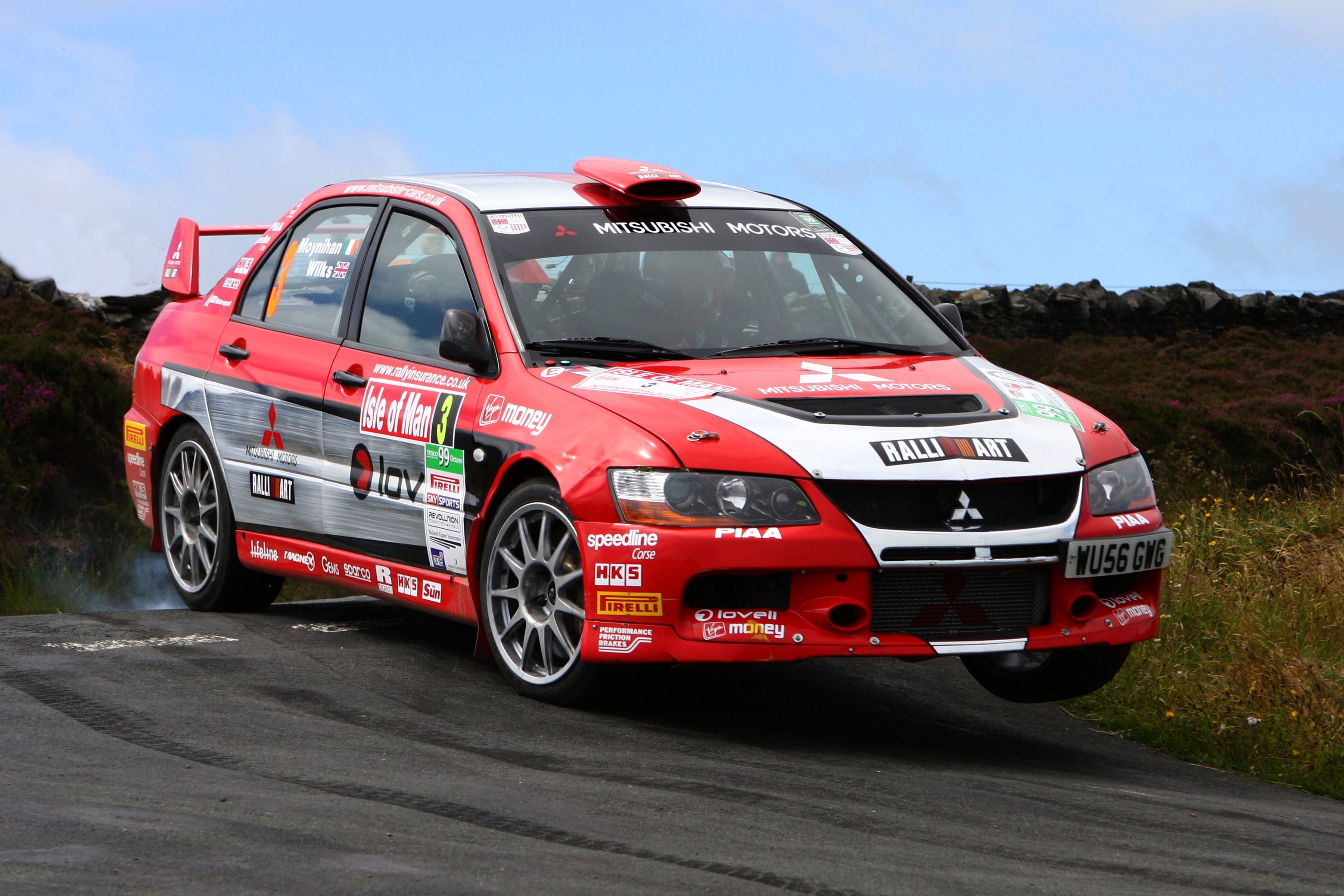 Mitsubishi Lancer Evo rally car on Isle of Man HD Wallpaper