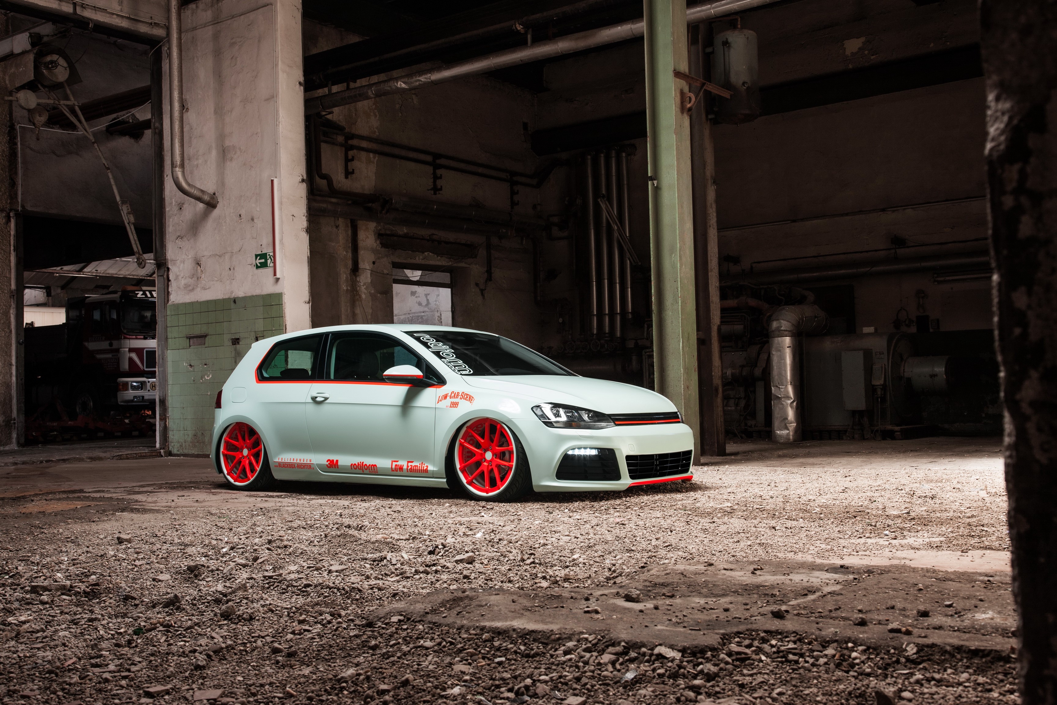 Volkswagen Golf VII Light Tron with red wheels HD Wallpaper