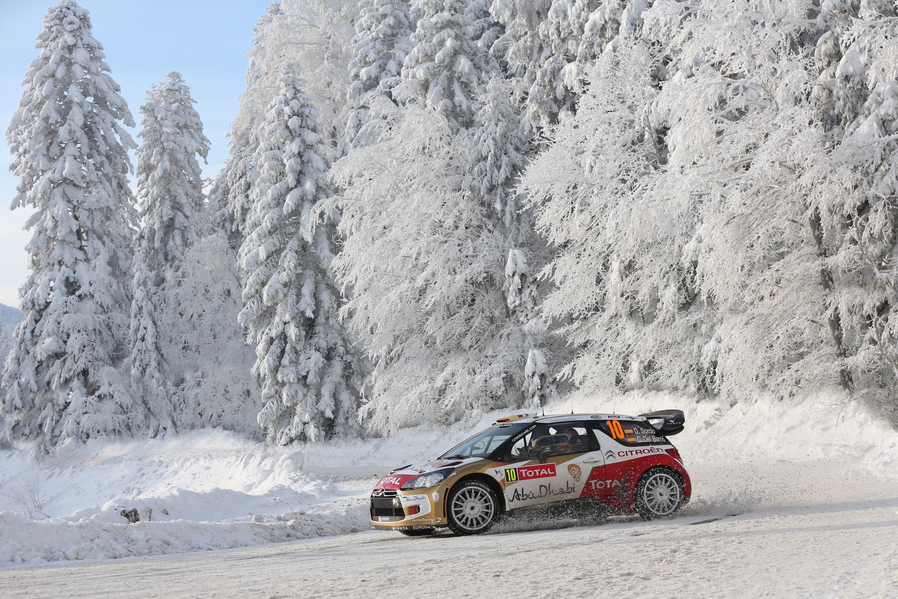 Citroen DS3 rally car driving on a snowy road HD Wallpaper