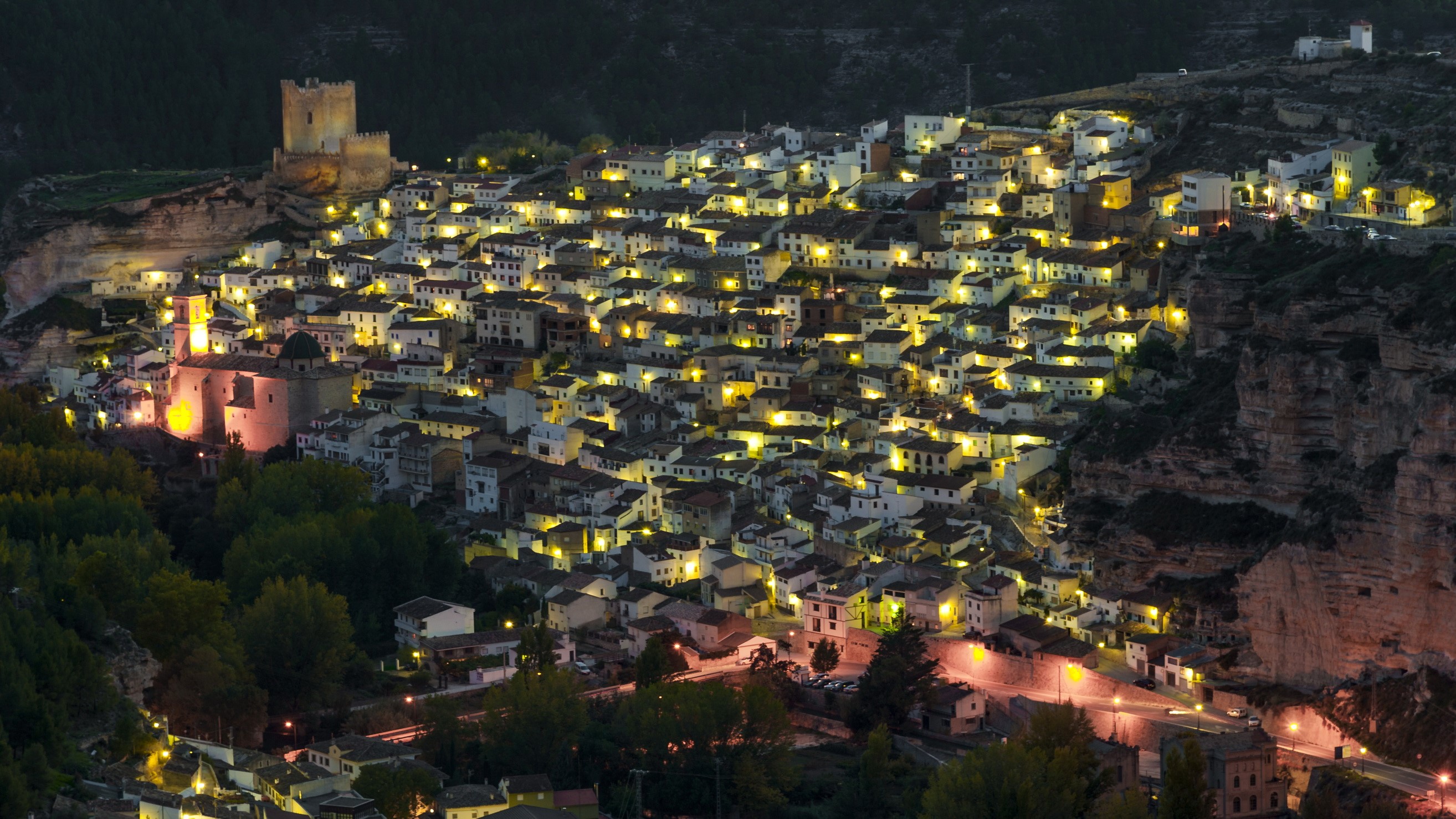 Village with castle at night in Albacete, Spain HD Wallpaper