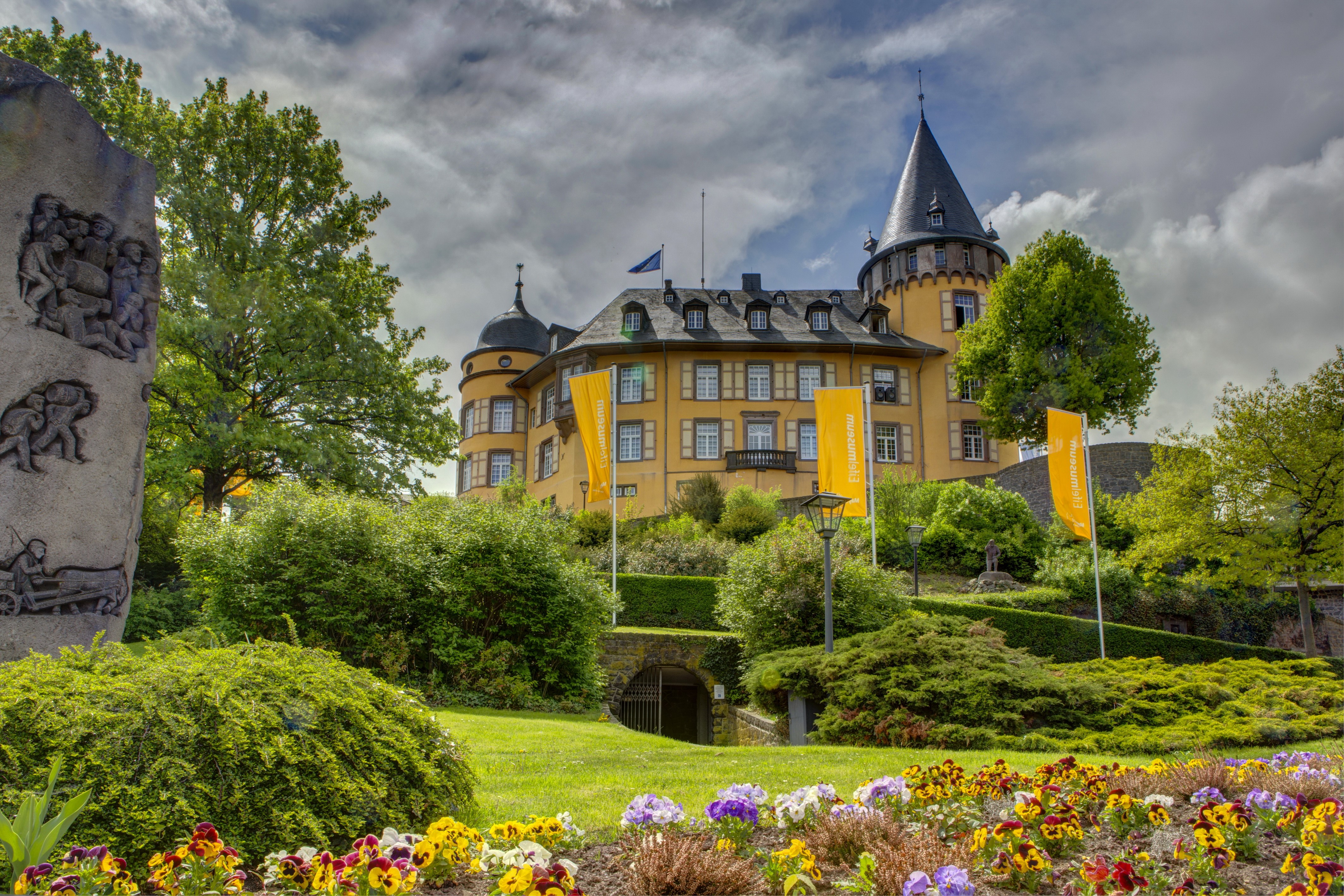 Castle in Mayen, Germany with Sculpture and Flowers HD Wallpaper