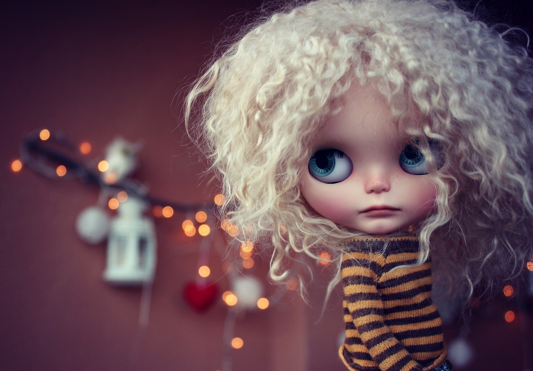 Doll with blonde curly hair and striped sweater HD Wallpaper