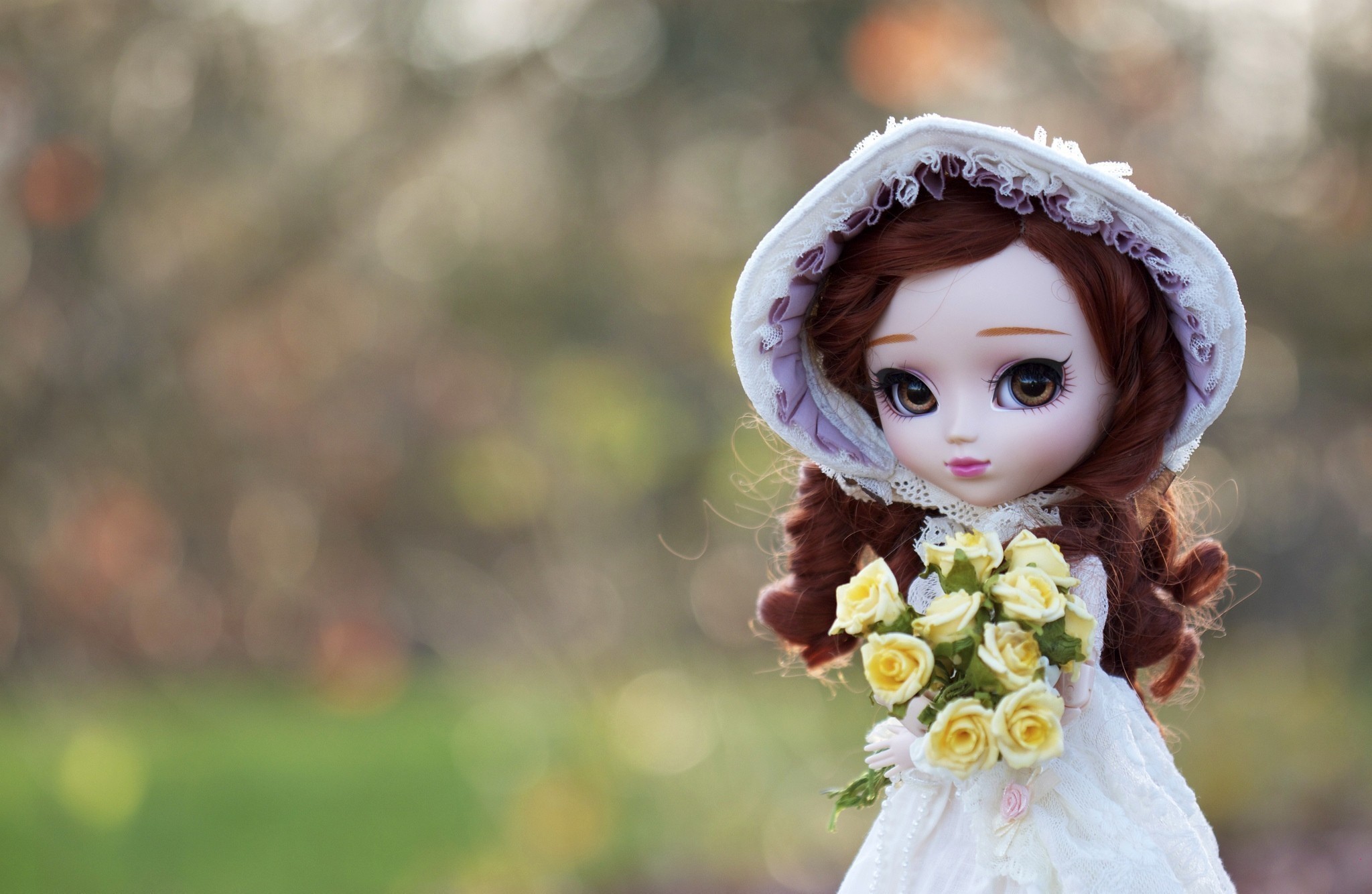Doll with brown hair holding a bouquet of yellow roses HD Wallpaper