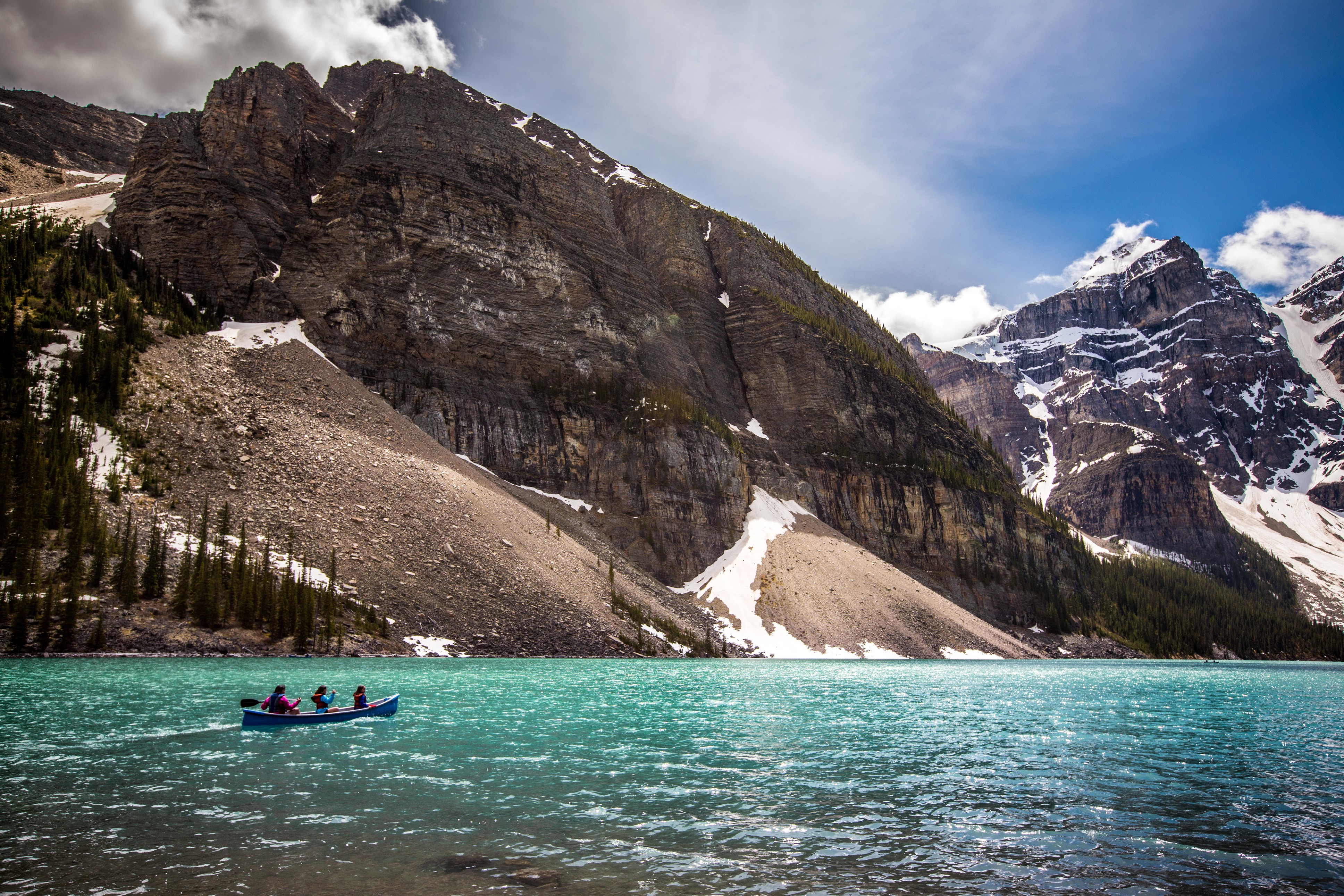 Canoe on a turquoise lake with mountains in Yoho, Canada HD Wallpaper