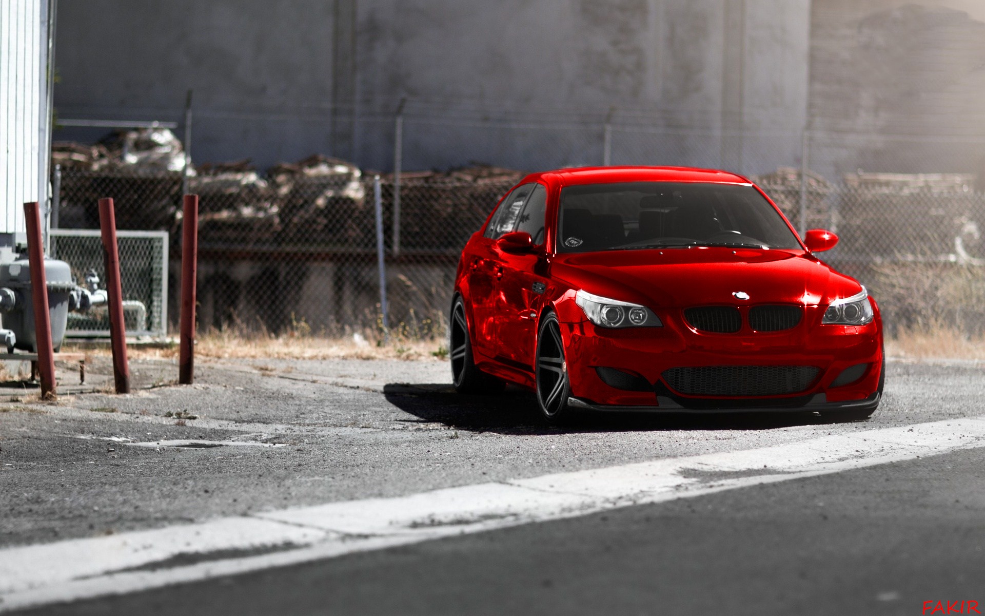 Red BMW M5 E60 parked on asphalt HD Wallpaper