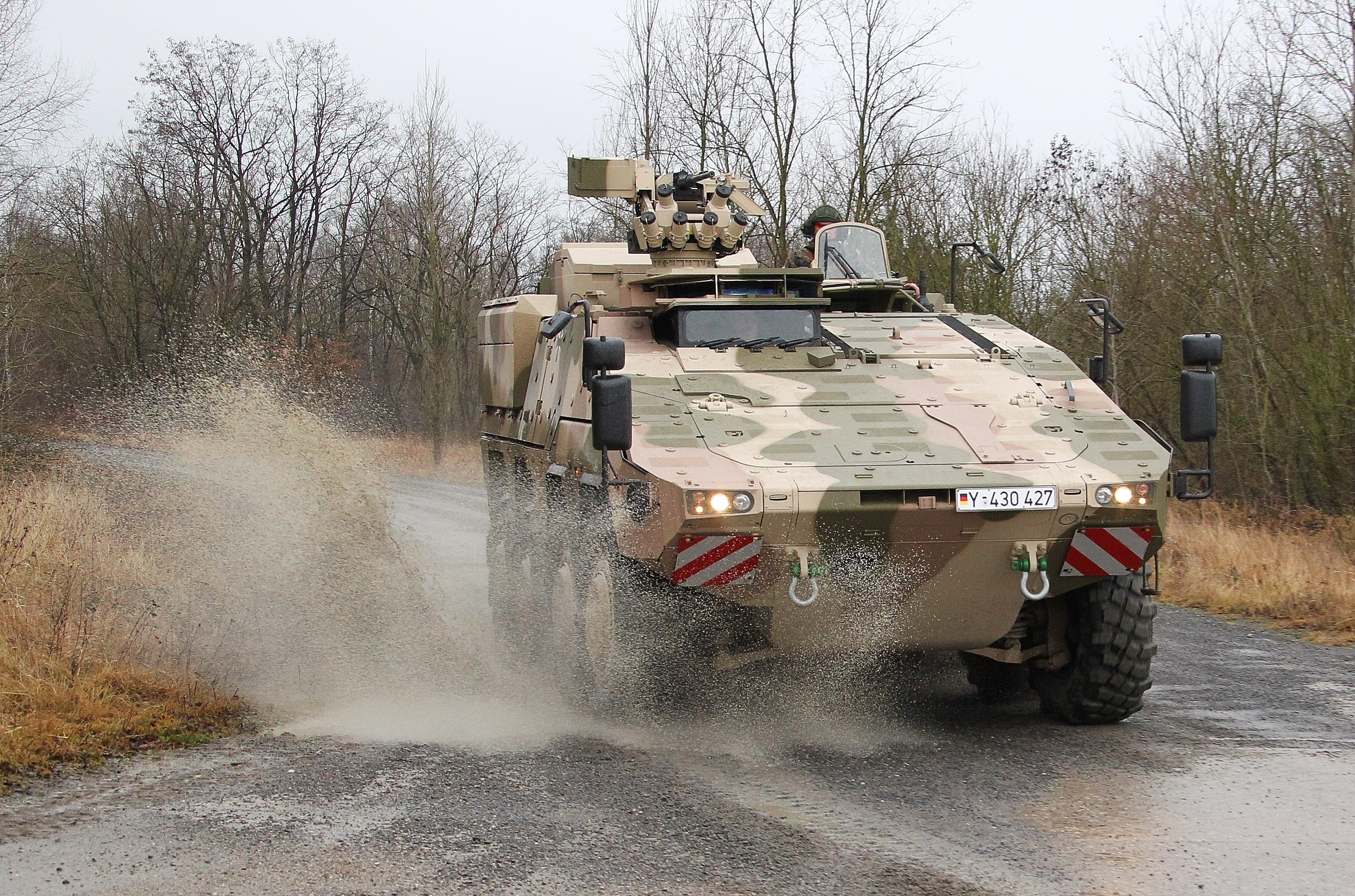 GTK Boxer armored personnel carrier driving through water HD Wallpaper