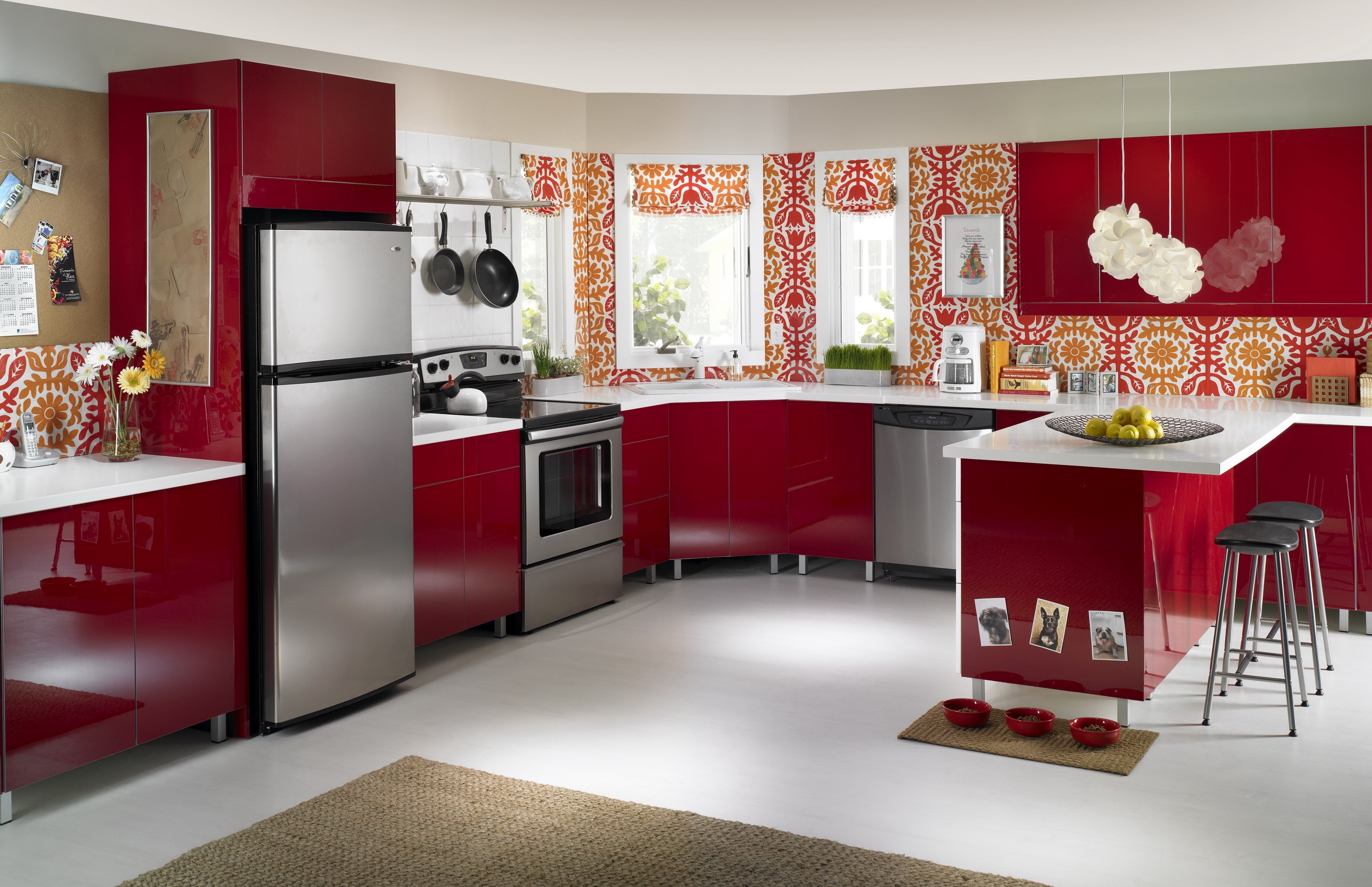 Modern red kitchen with stainless steel appliances HD Wallpaper