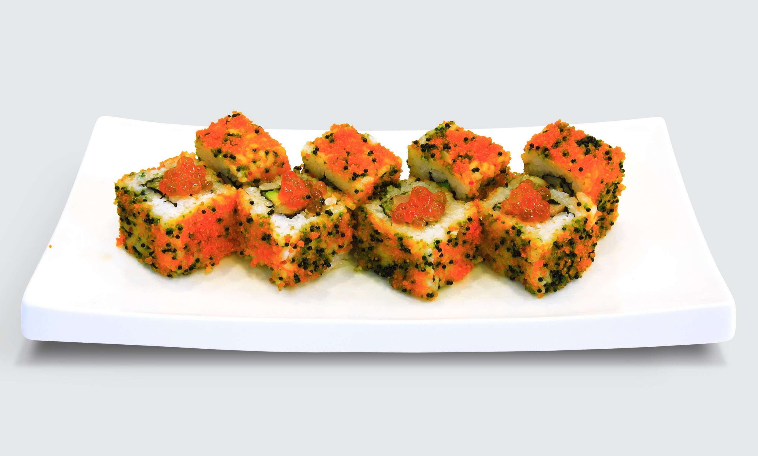 Sushi rolls with caviar on a white plate HD Wallpaper
