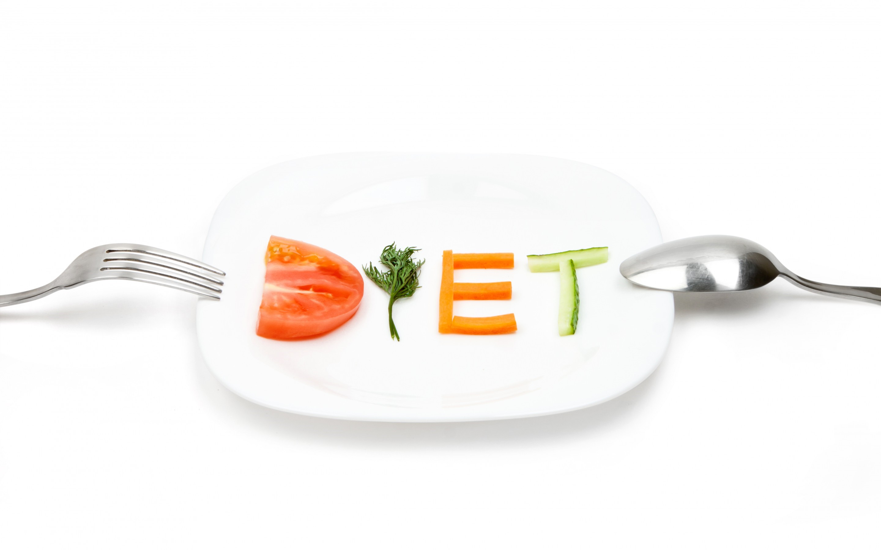 Diet spelled with vegetables on a plate with fork and spoon HD Wallpaper