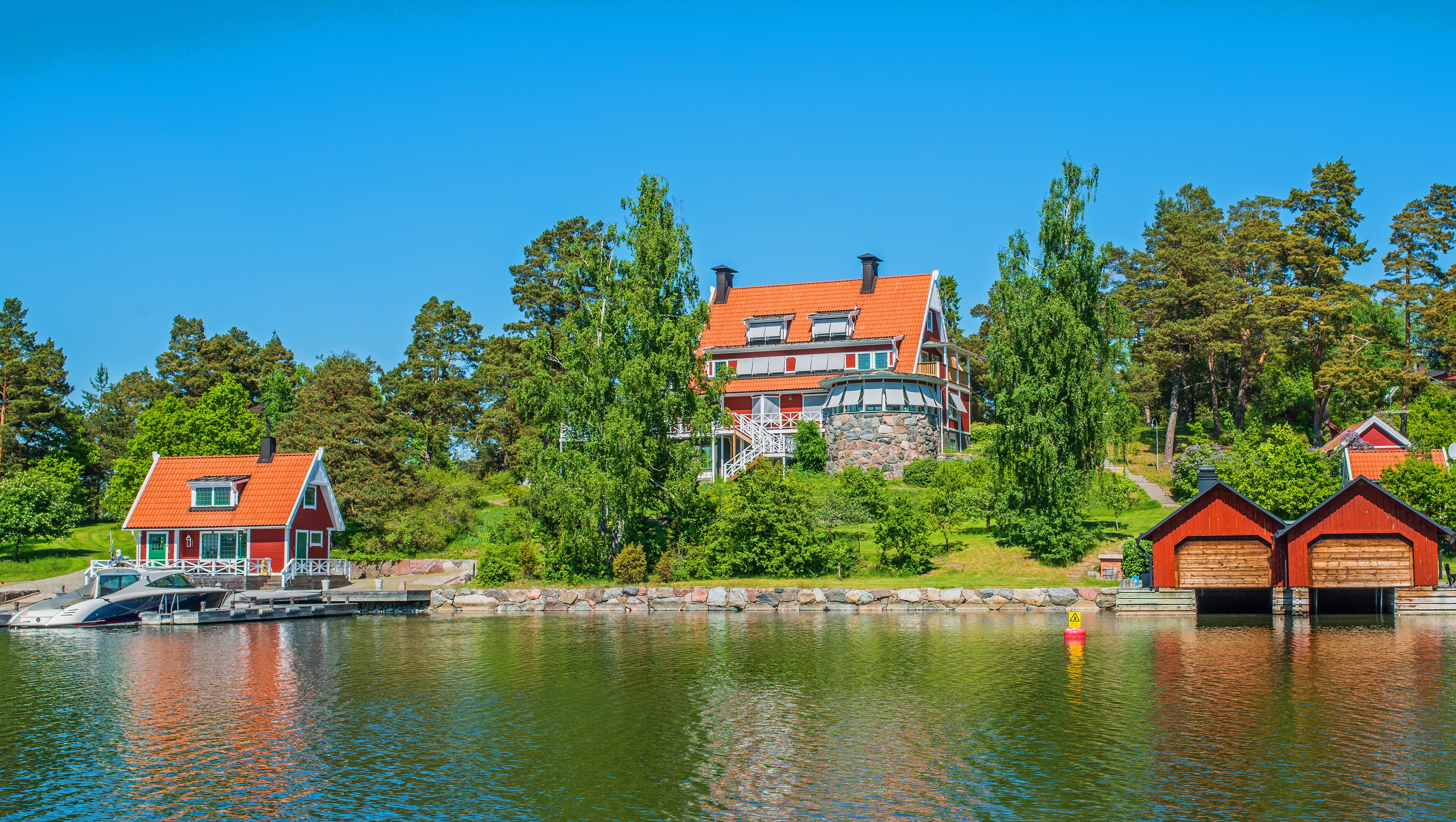 Vaxholm, Sweden Waterfront with Houses and Boathouses HD Wallpaper